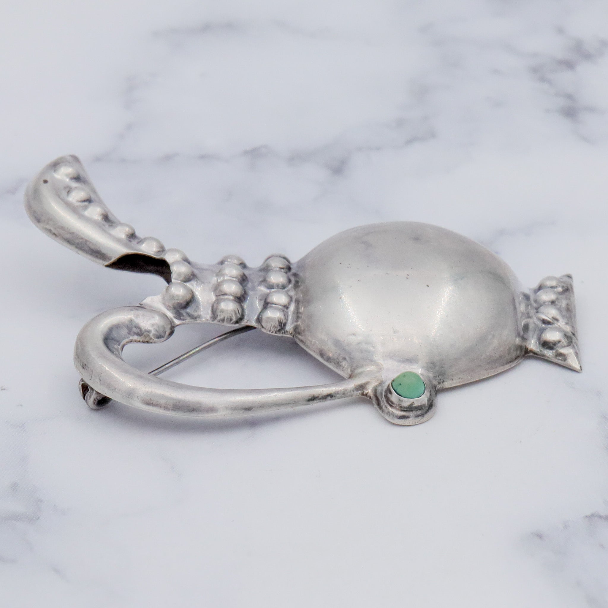 Antique Mexican sterling silver fancy pitcher with turquoise posey holder brooch