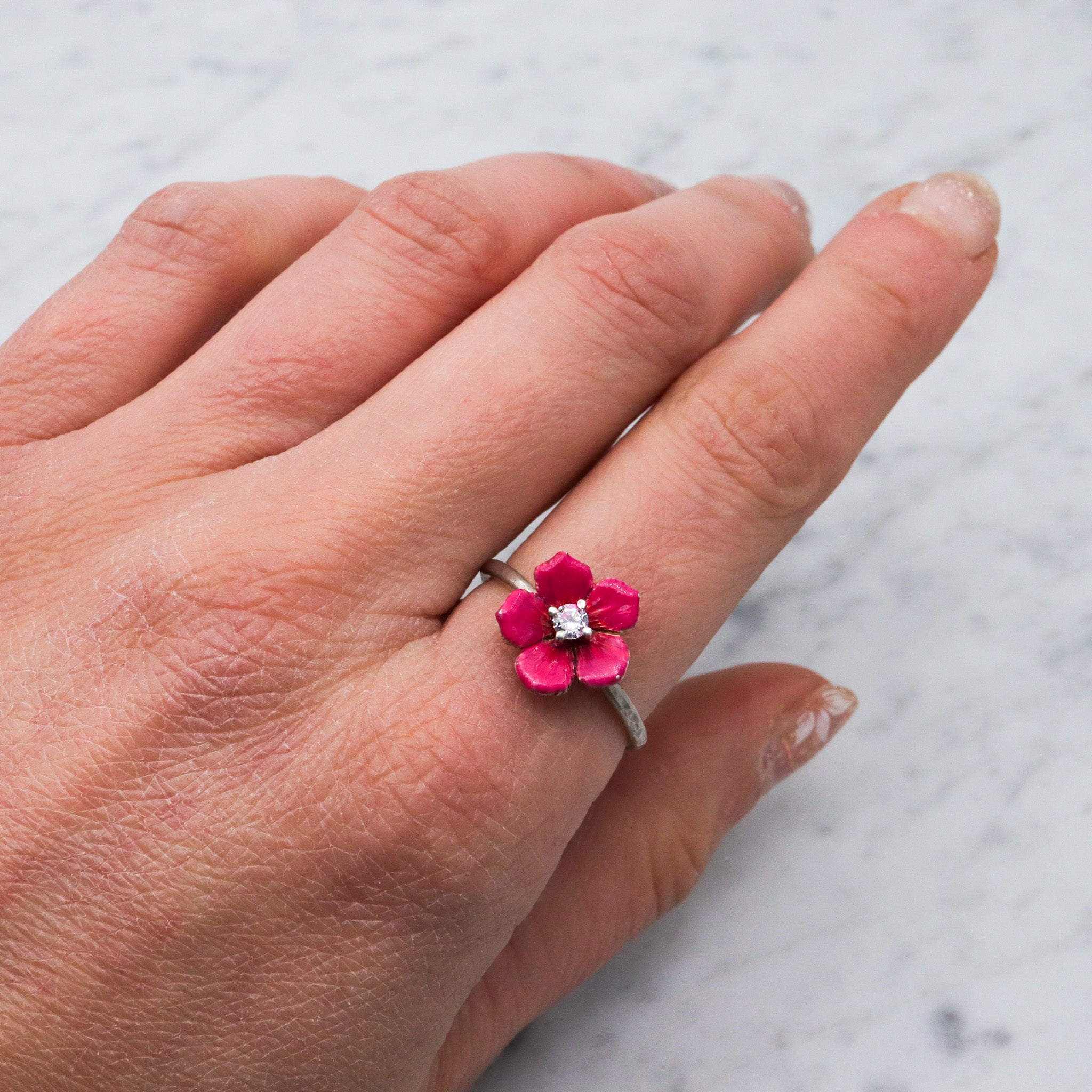 Vintage sterling silver enamel pink flower ring with cubic zirconia center, sz 9 adjustable