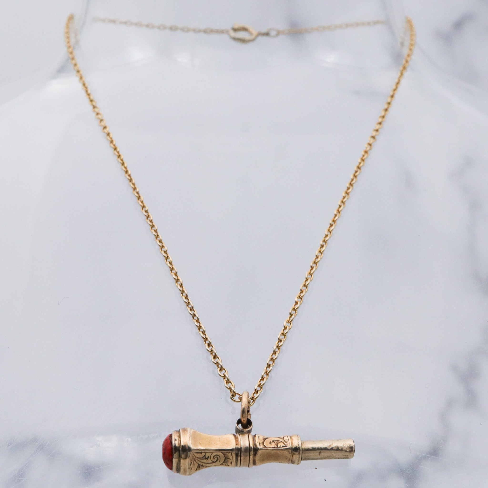 Antique Victorian 10k gold watch key fob with red stone end