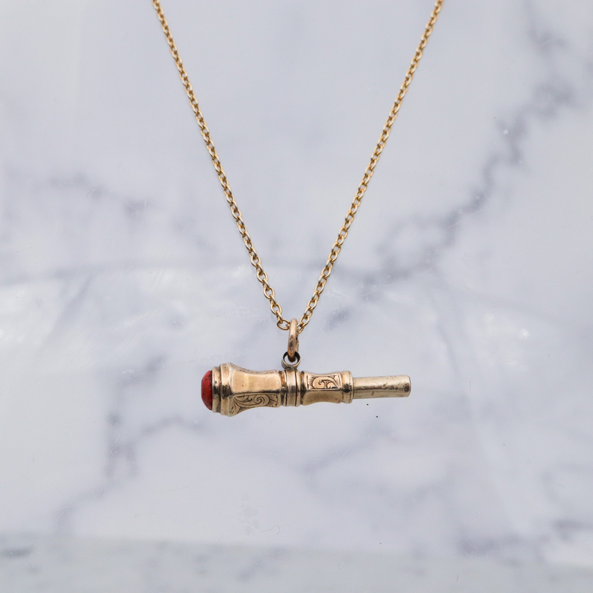 Antique Victorian 10k gold watch key fob with red stone end