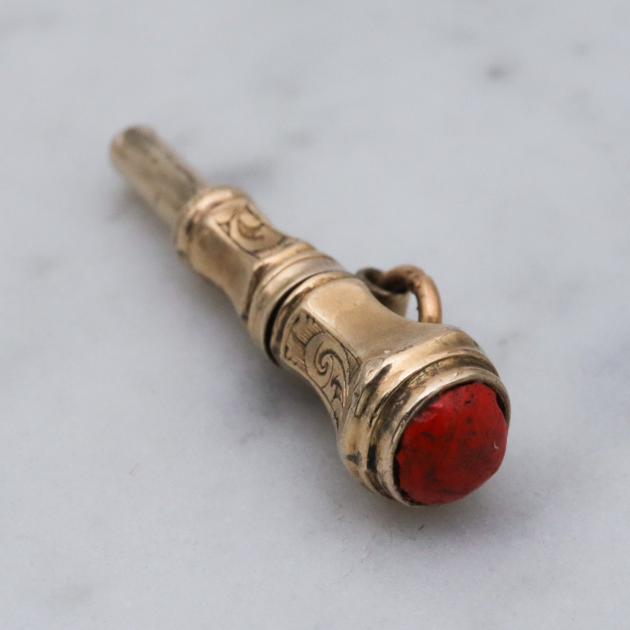 Antique Victorian 10k gold watch key fob with red stone end