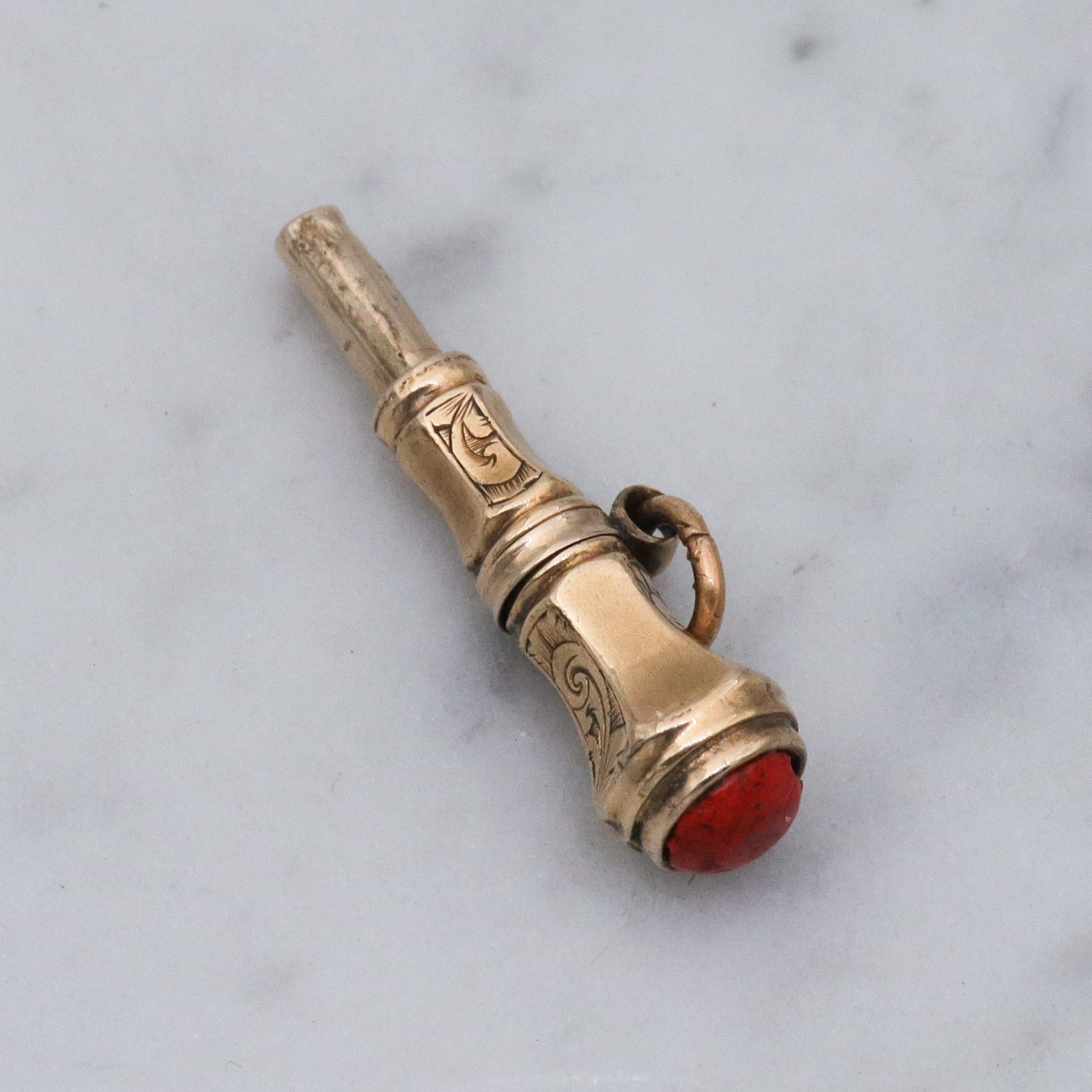 Antique Victorian 10k gold watch key fob with red stone end