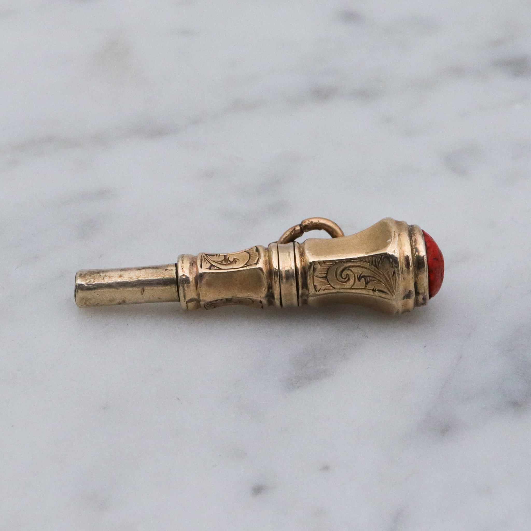 Antique Victorian 10k gold watch key fob with red stone end