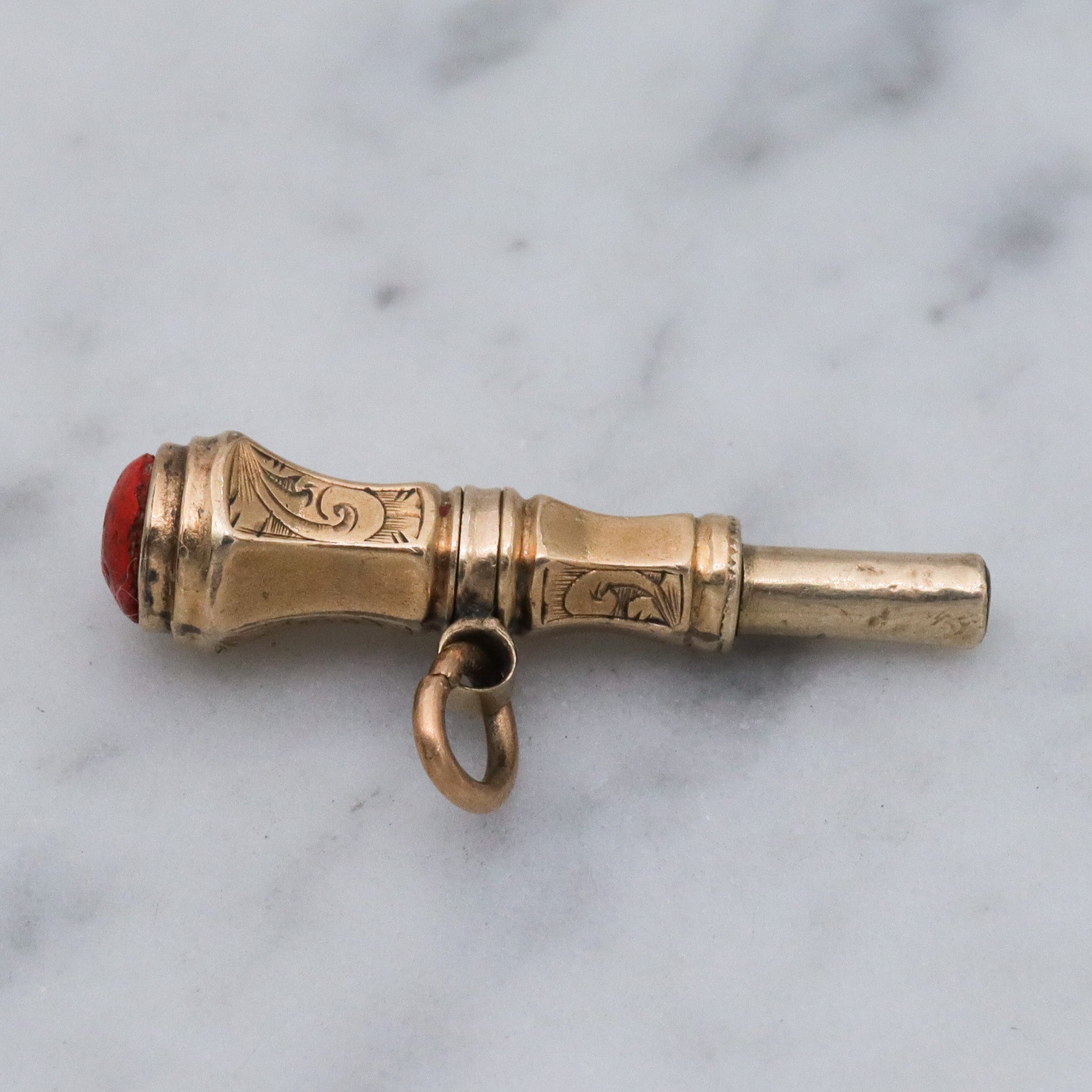 Antique Victorian 10k gold watch key fob with red stone end