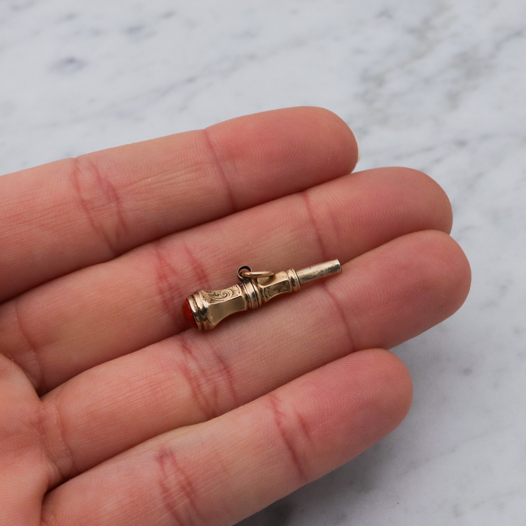 Antique Victorian 10k gold watch key fob with red stone end