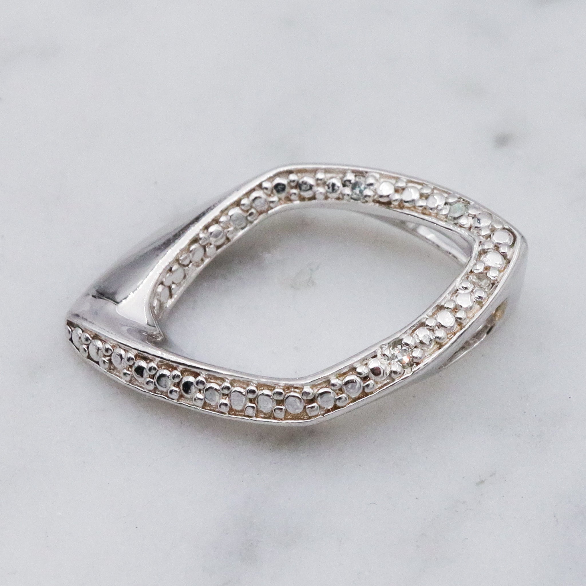 Vintage sterling silver and diamond abstract pendant