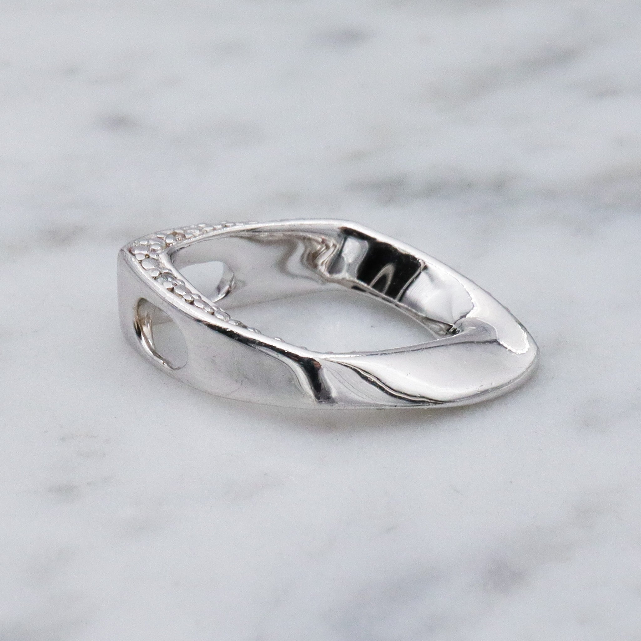 Vintage sterling silver and diamond abstract pendant