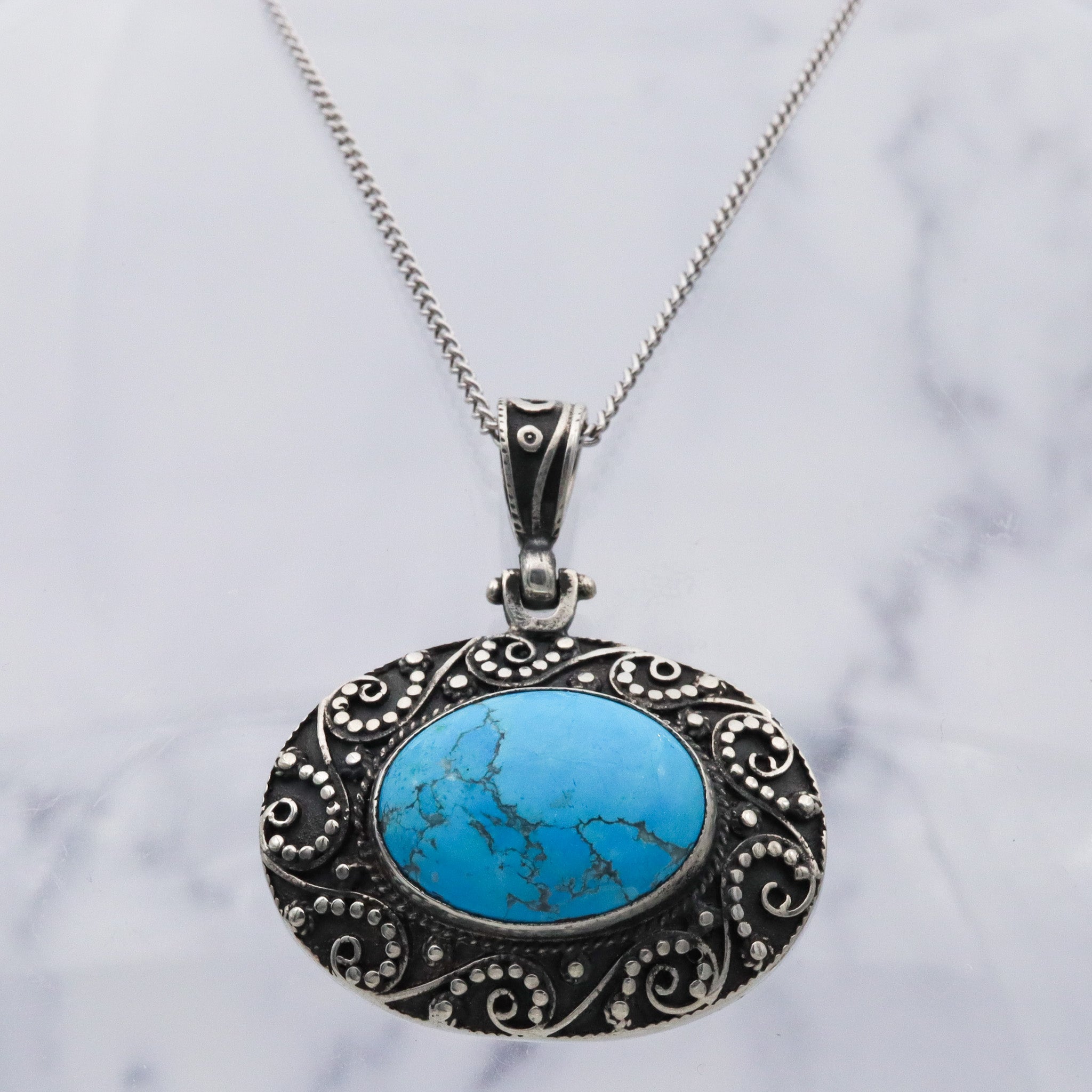 Vintage sterling silver turquoise and applied bead work pendant