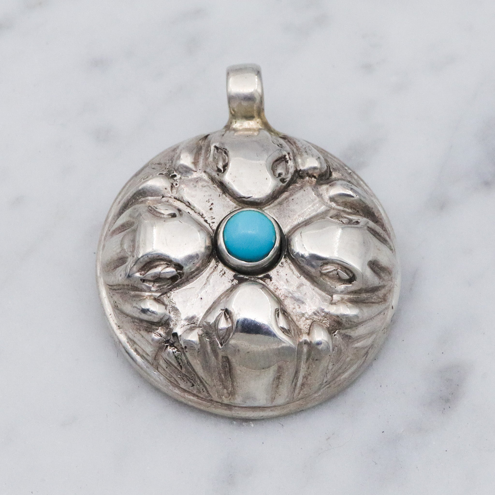 Vintage sterling silver and turquoise hollow pendant