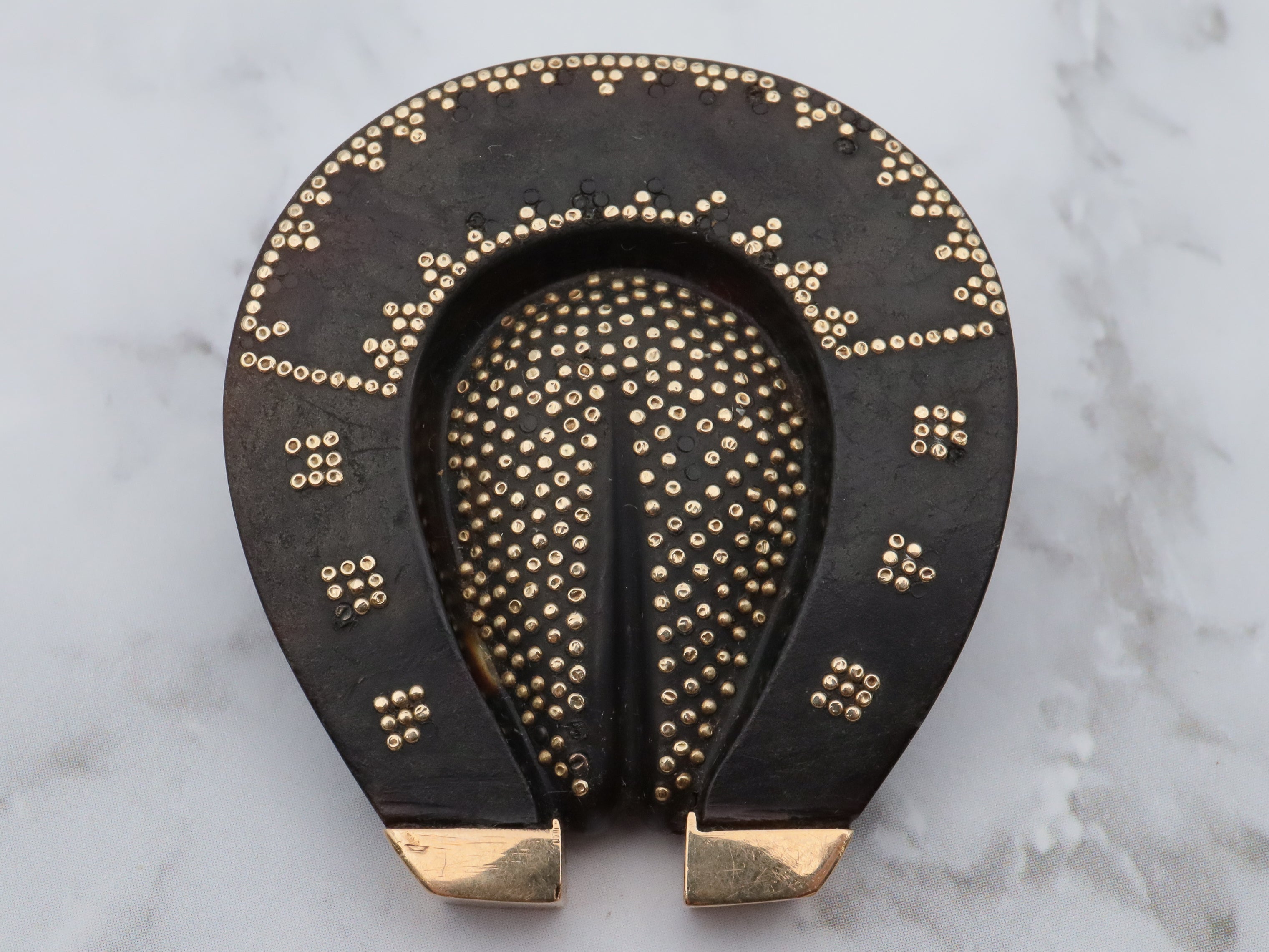 Antique Victorian 10k gold pique d'or gold overlay tortoiseshell horseshoe brooch