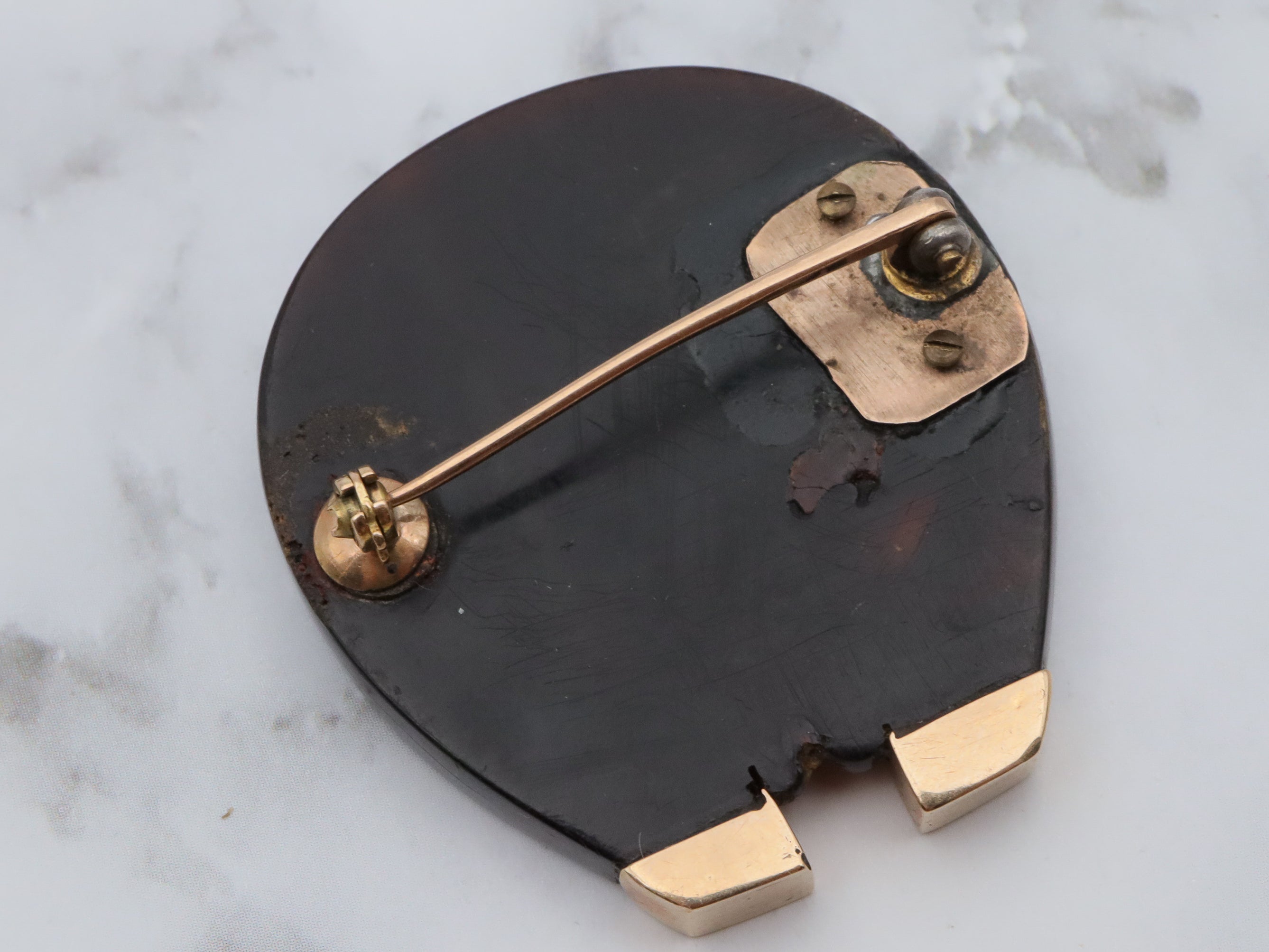 Antique Victorian 10k gold pique d'or gold overlay tortoiseshell horseshoe brooch