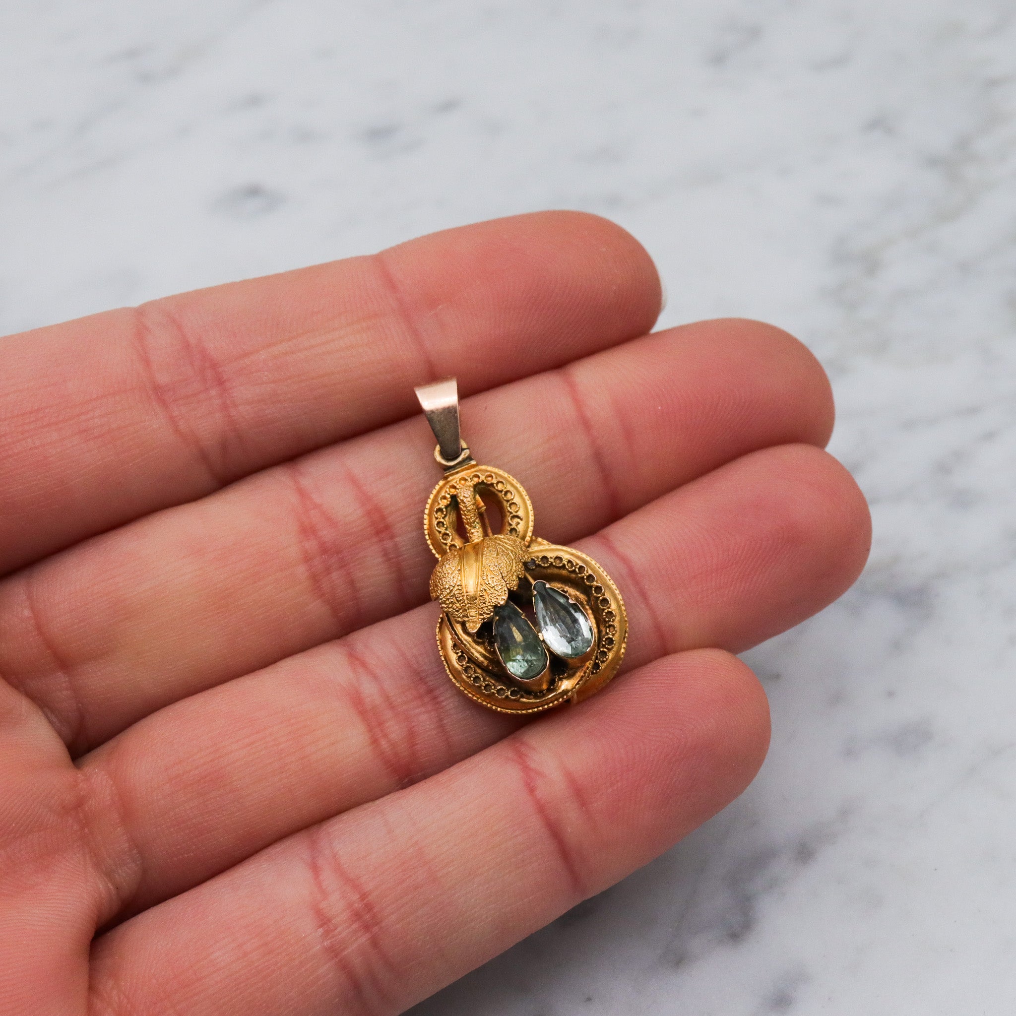 Antique early Victorian 10k gold & natural aquamarine knot pendant
