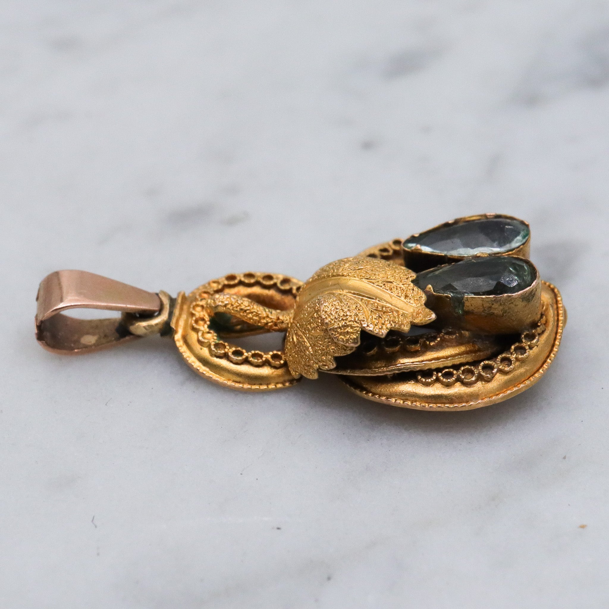 Antique early Victorian 10k gold & natural aquamarine knot pendant