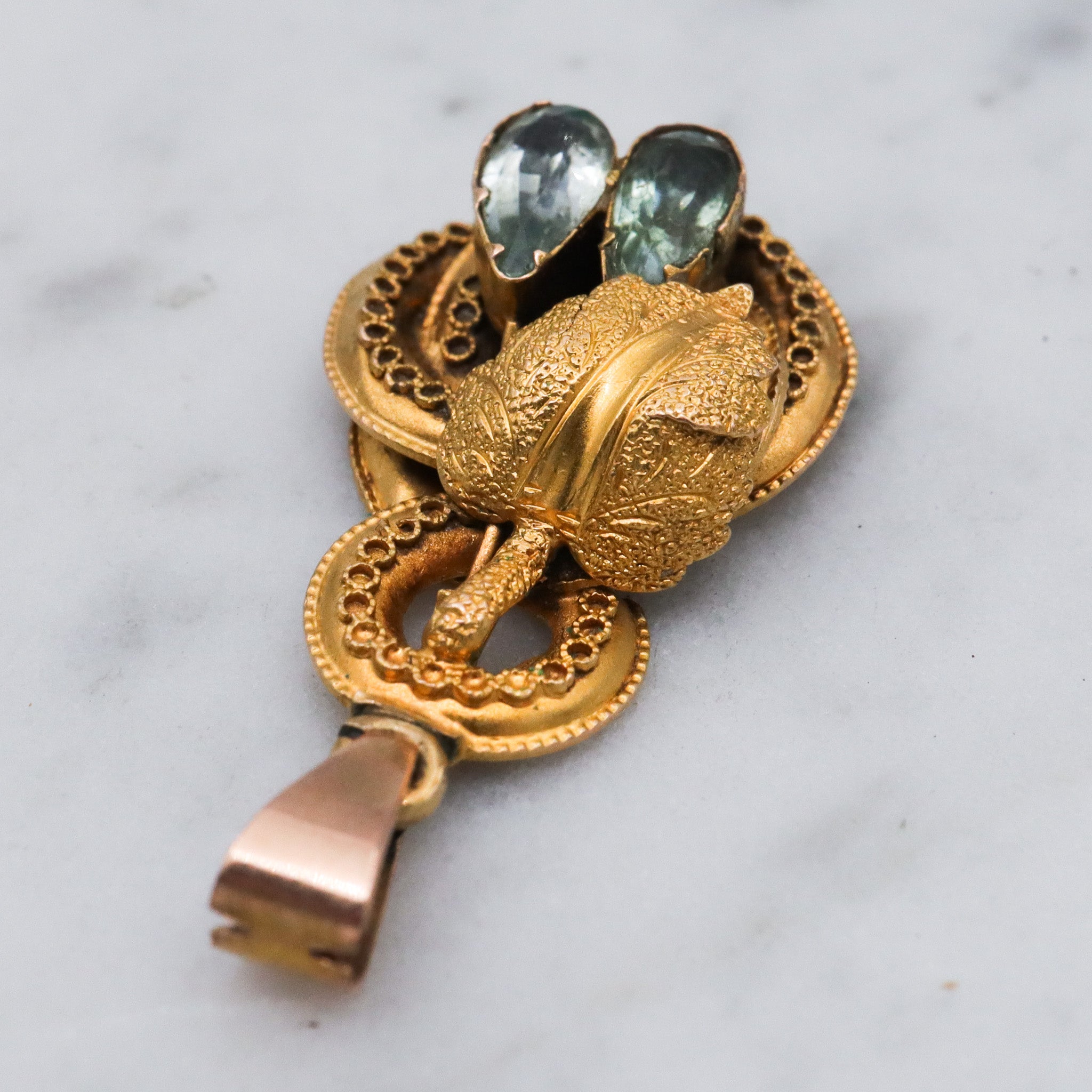 Antique early Victorian 10k gold & natural aquamarine knot pendant