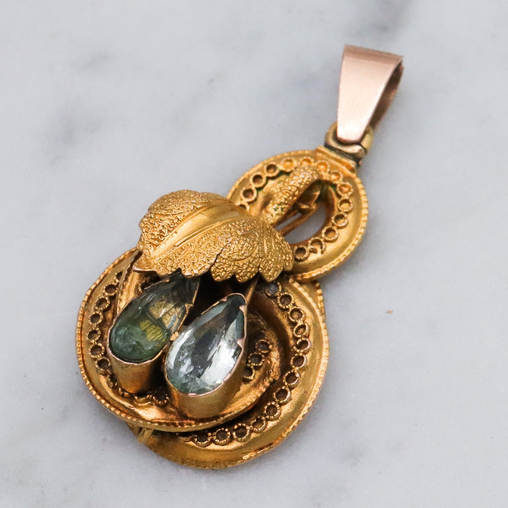 Antique early Victorian 10k gold & natural aquamarine knot pendant