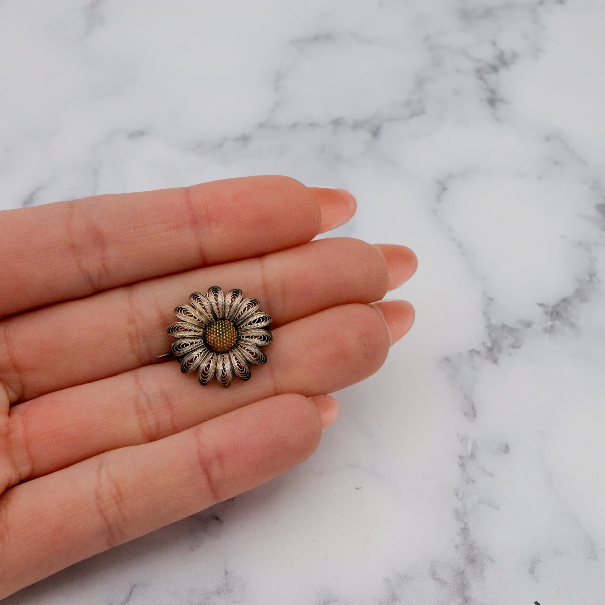 Antique Victorian sterling silver filigree daisy brooch