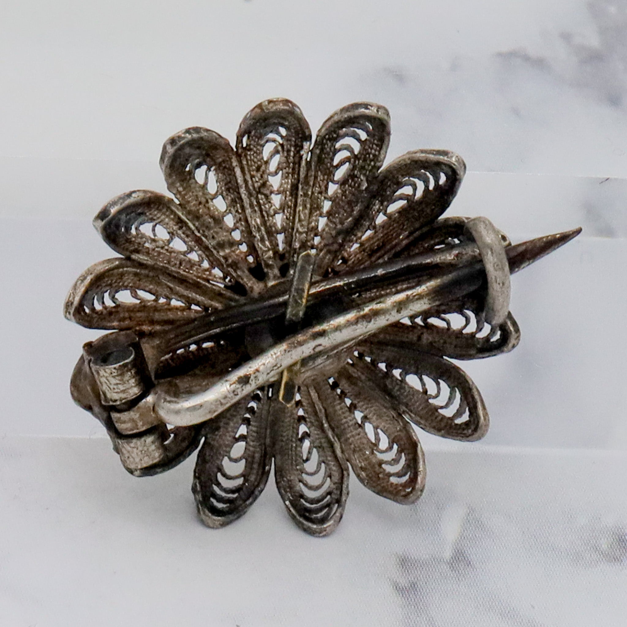 Antique Victorian sterling silver filigree daisy brooch