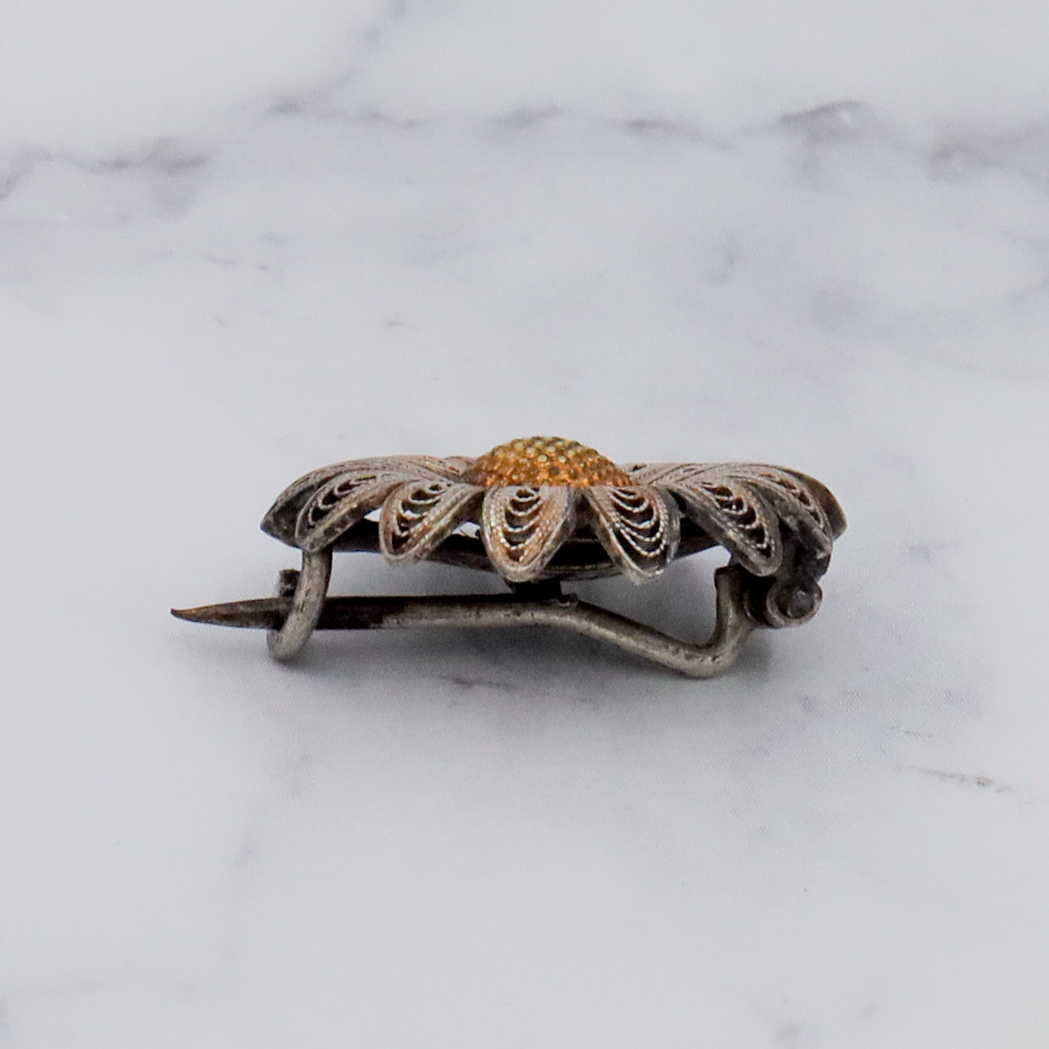 Antique Victorian sterling silver filigree daisy brooch