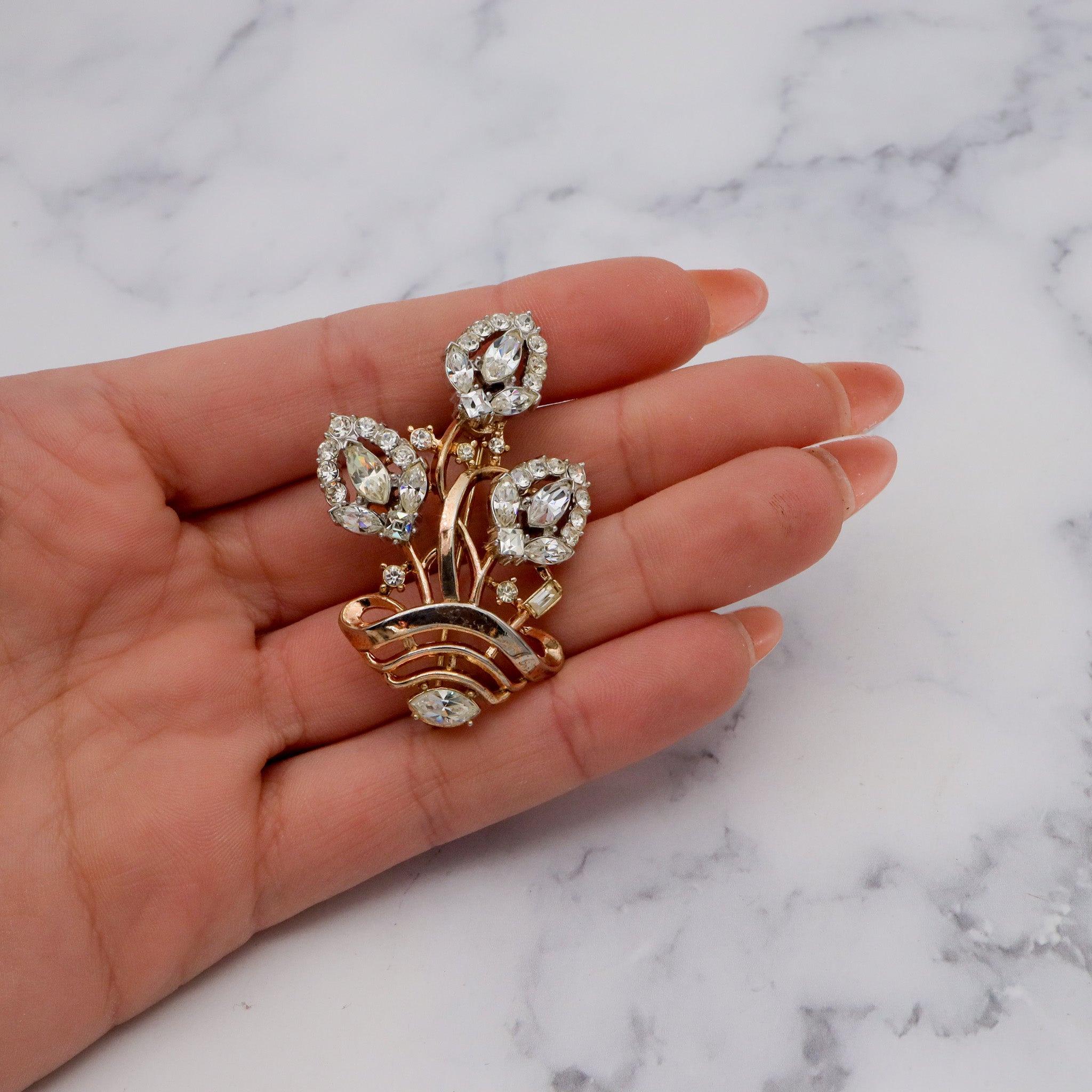 Antique Art Deco Alfred Phillipe Trifari gold-plated & rhinestone floral bouquet basket brooch