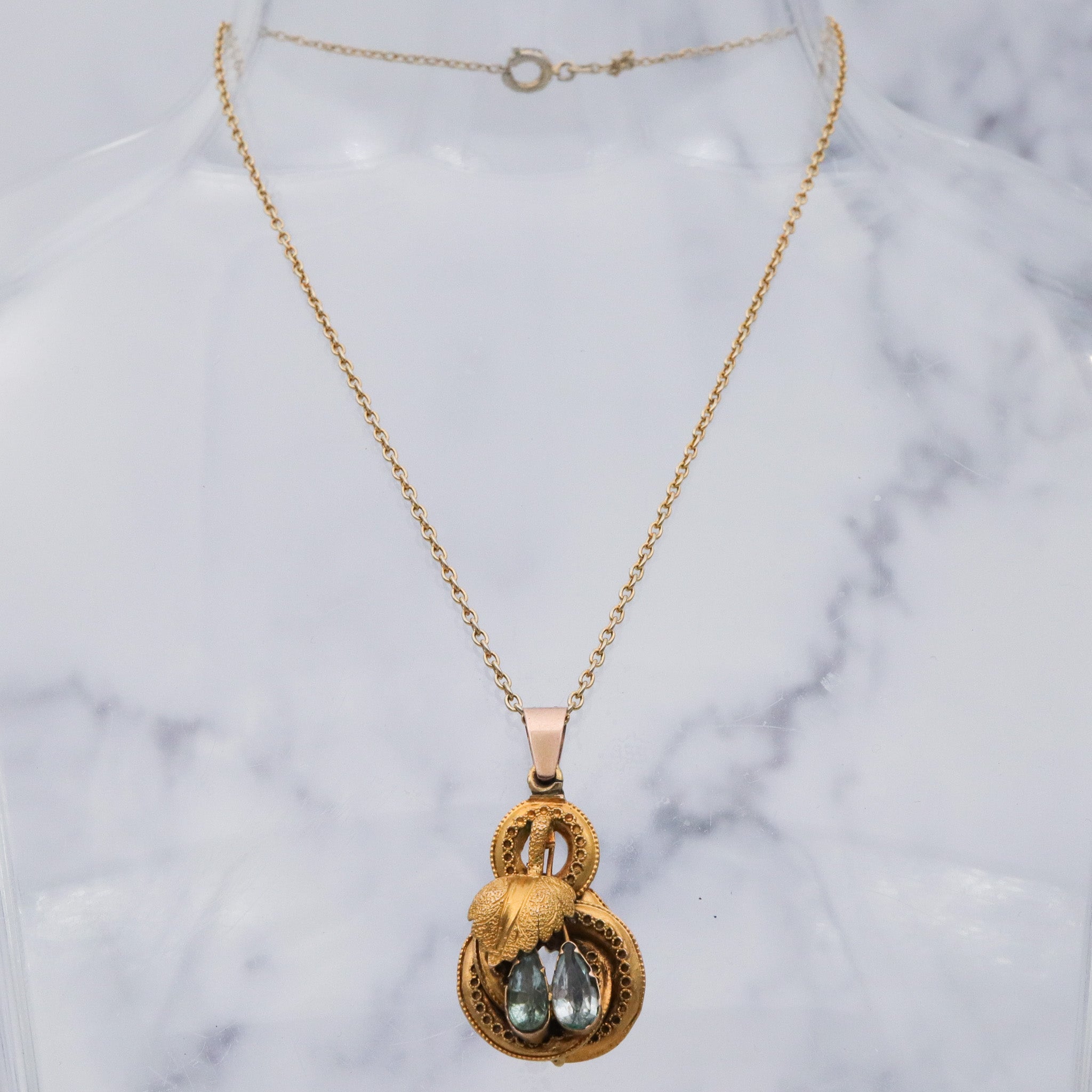 Antique early Victorian 10k gold & natural aquamarine knot pendant
