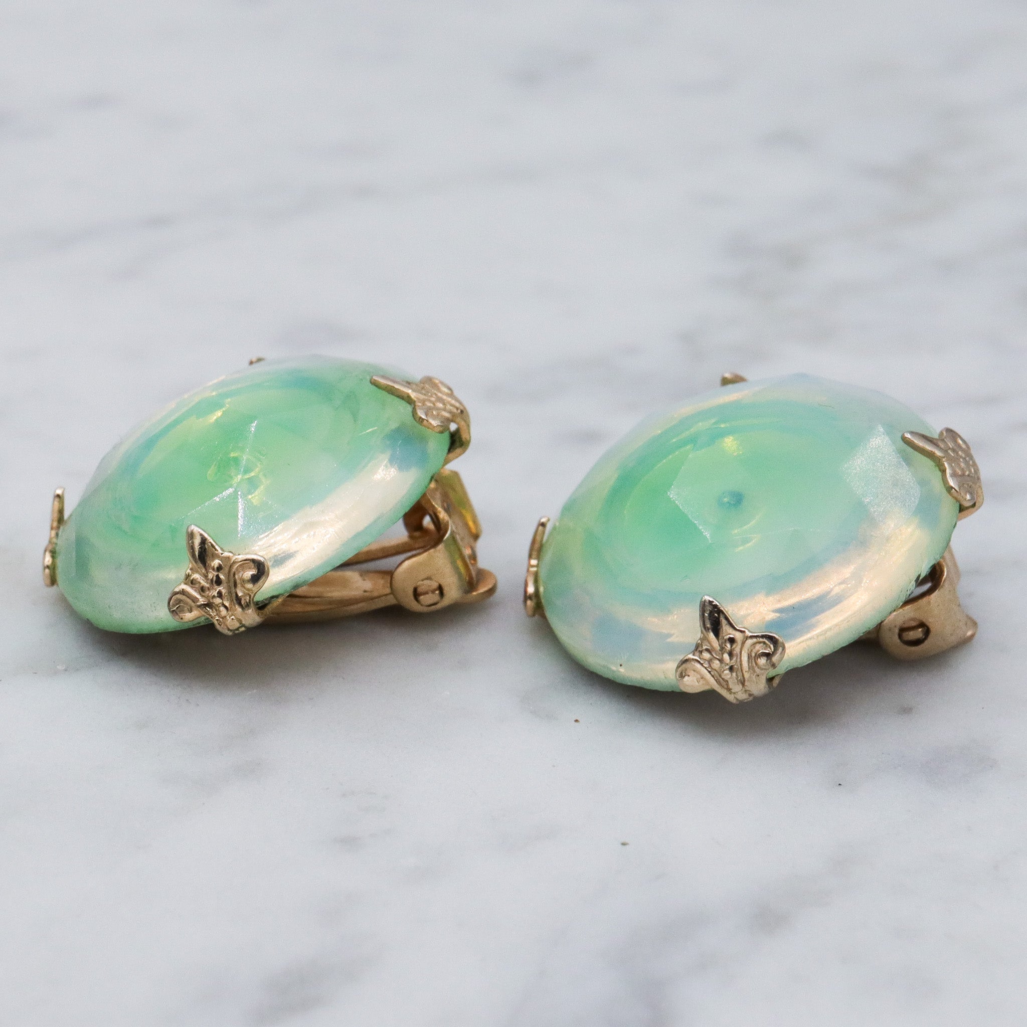 Mid Century Vogue green iridescent glass bubble earrings