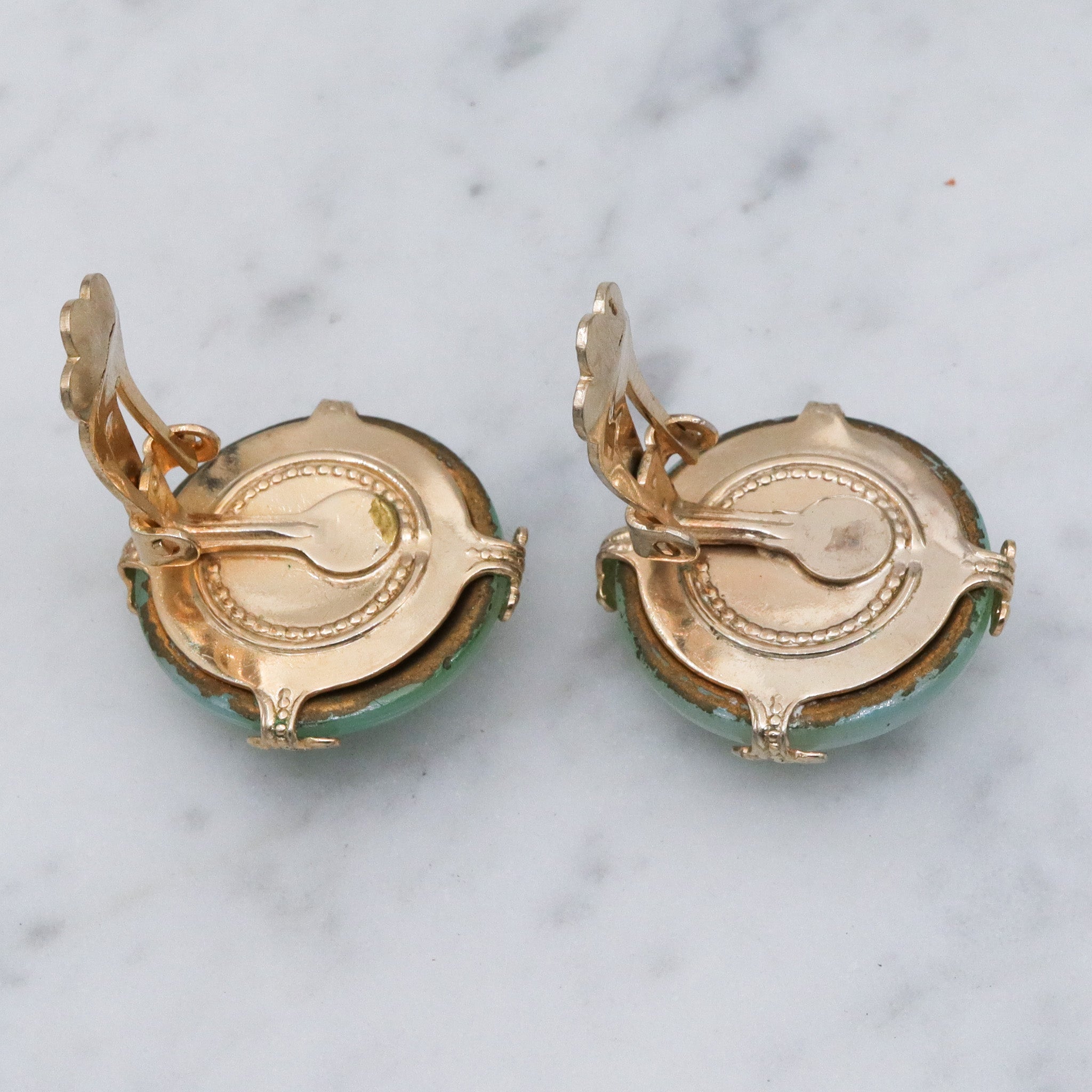 Mid Century Vogue green iridescent glass bubble earrings