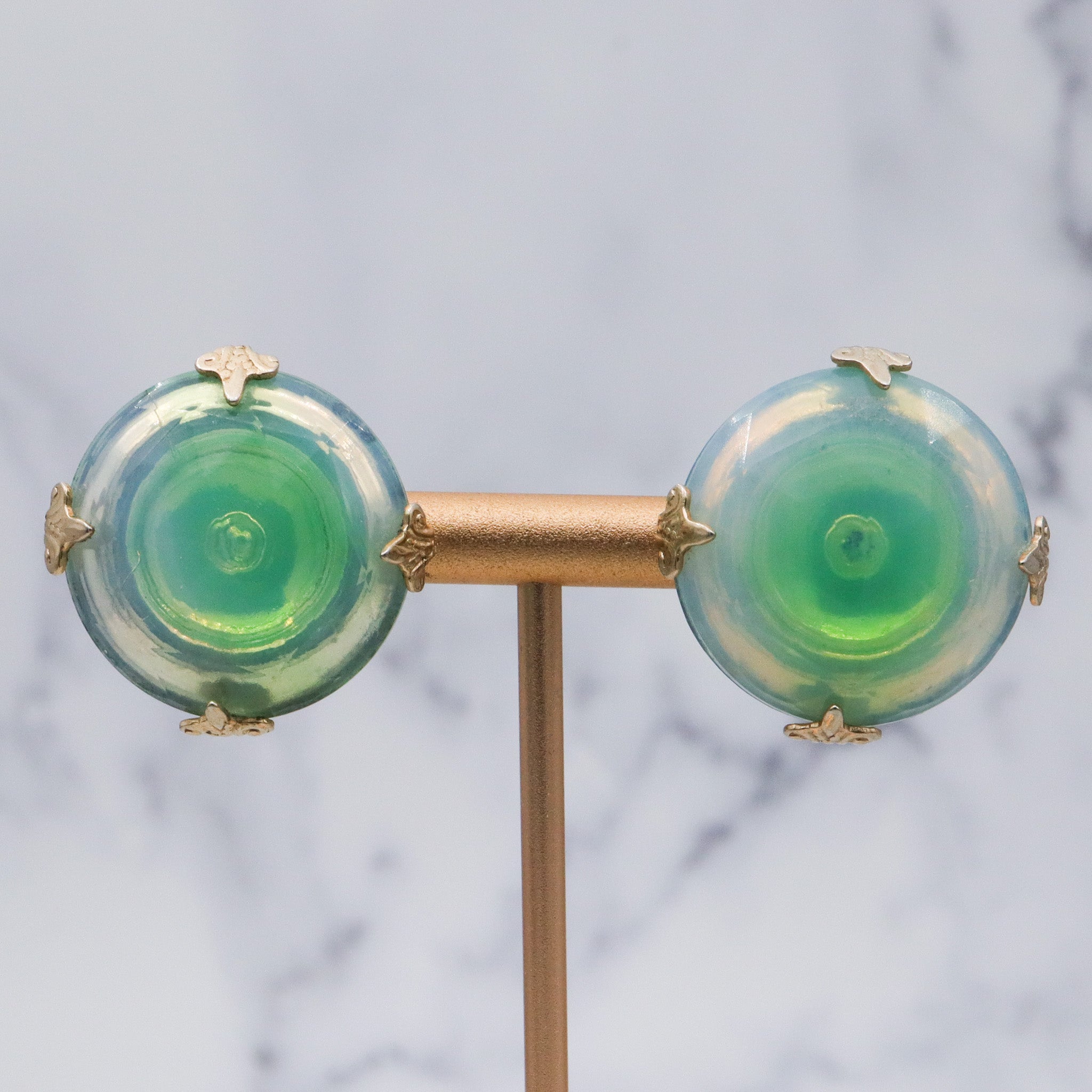 Mid Century Vogue green iridescent glass bubble earrings