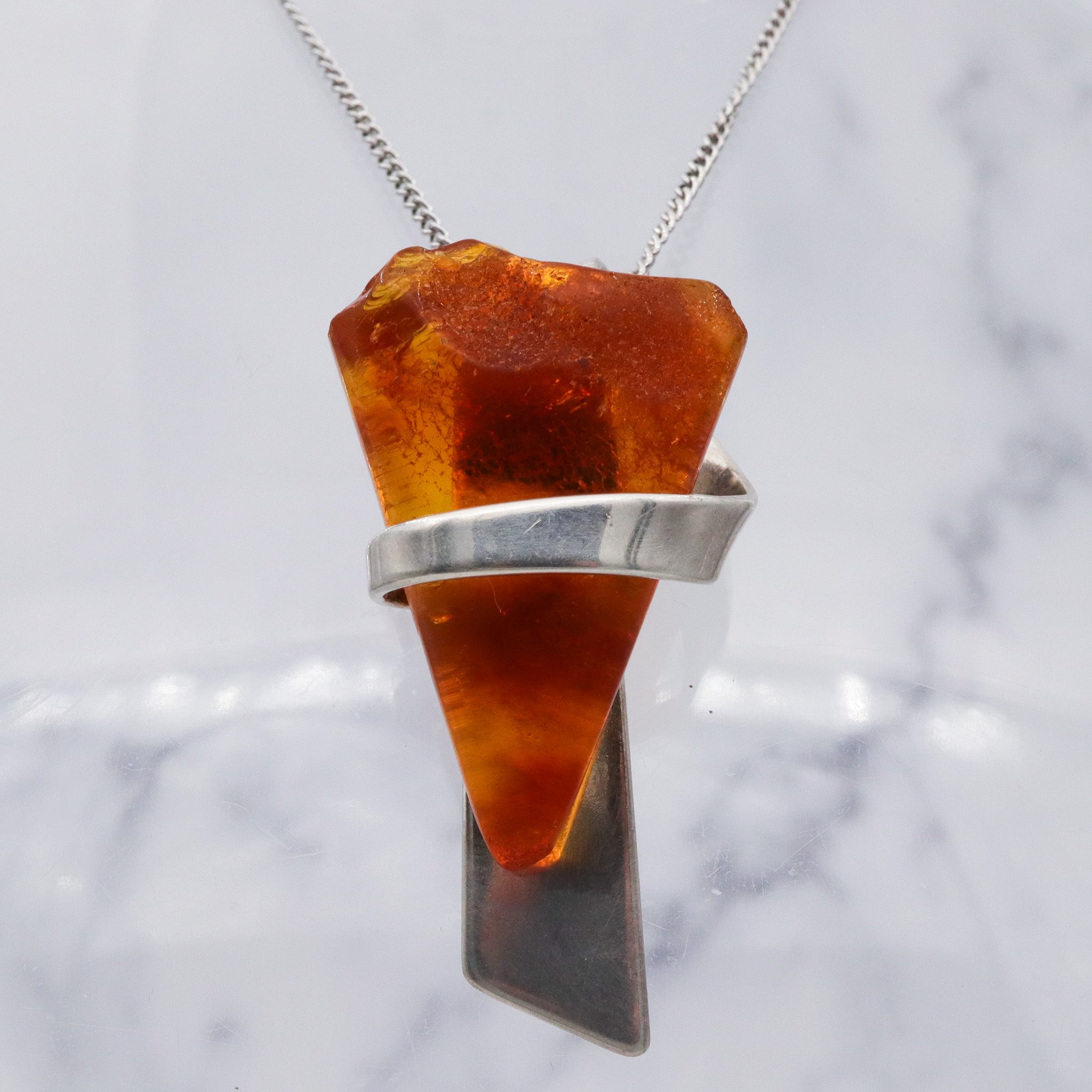 Mid Century sterling silver Baltic amber triangle pendant