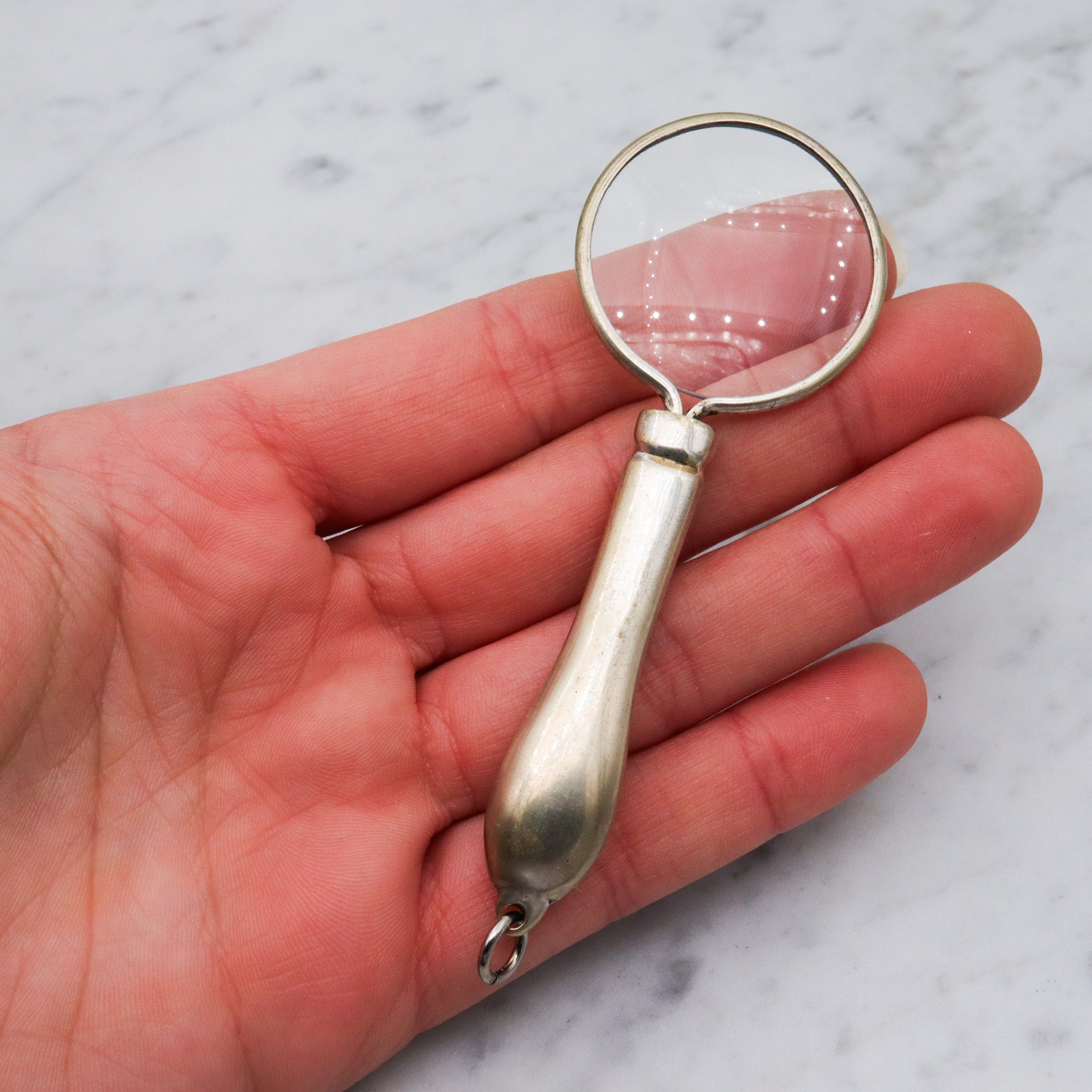 Antique silver plated magnifying glass pendant