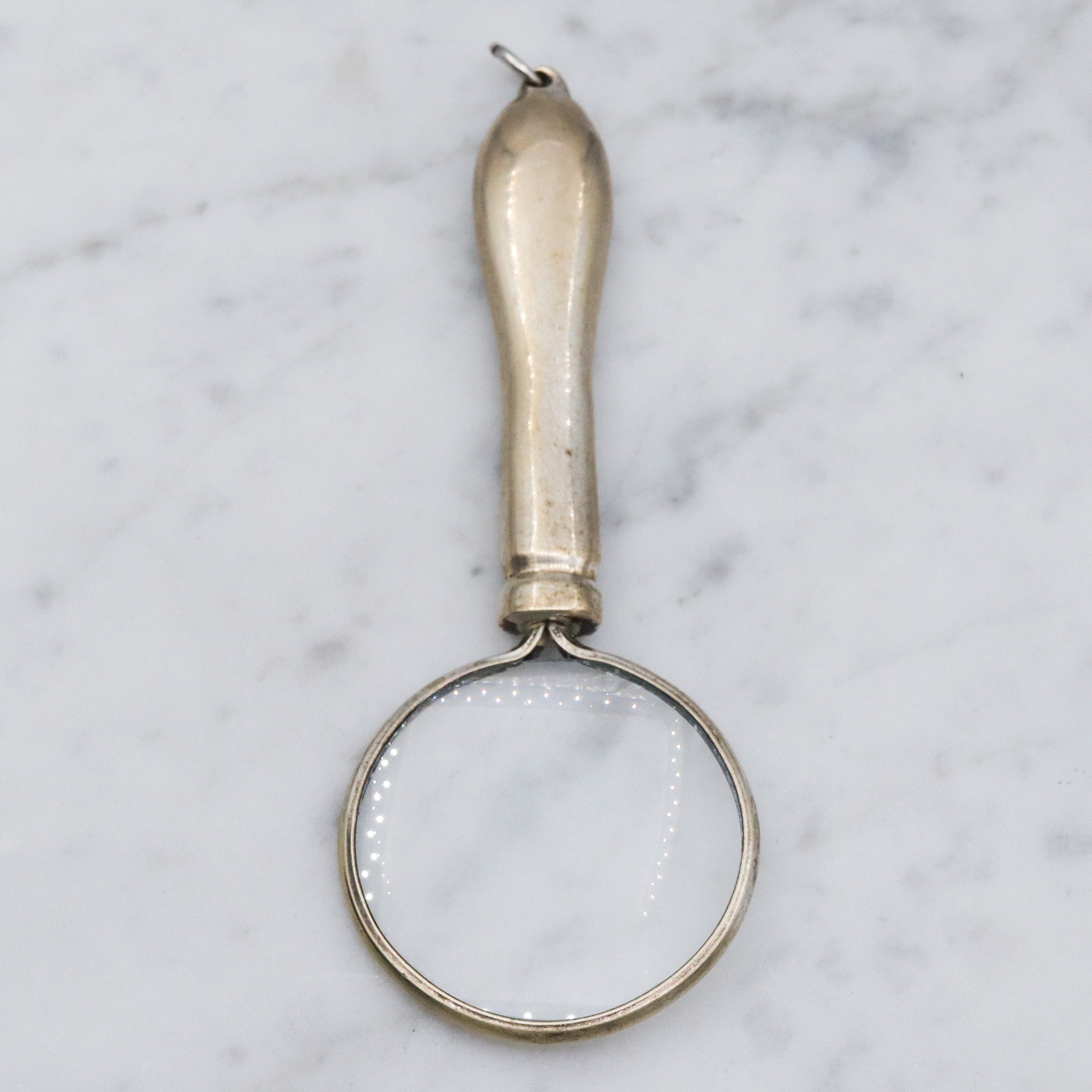 Antique silver plated magnifying glass pendant