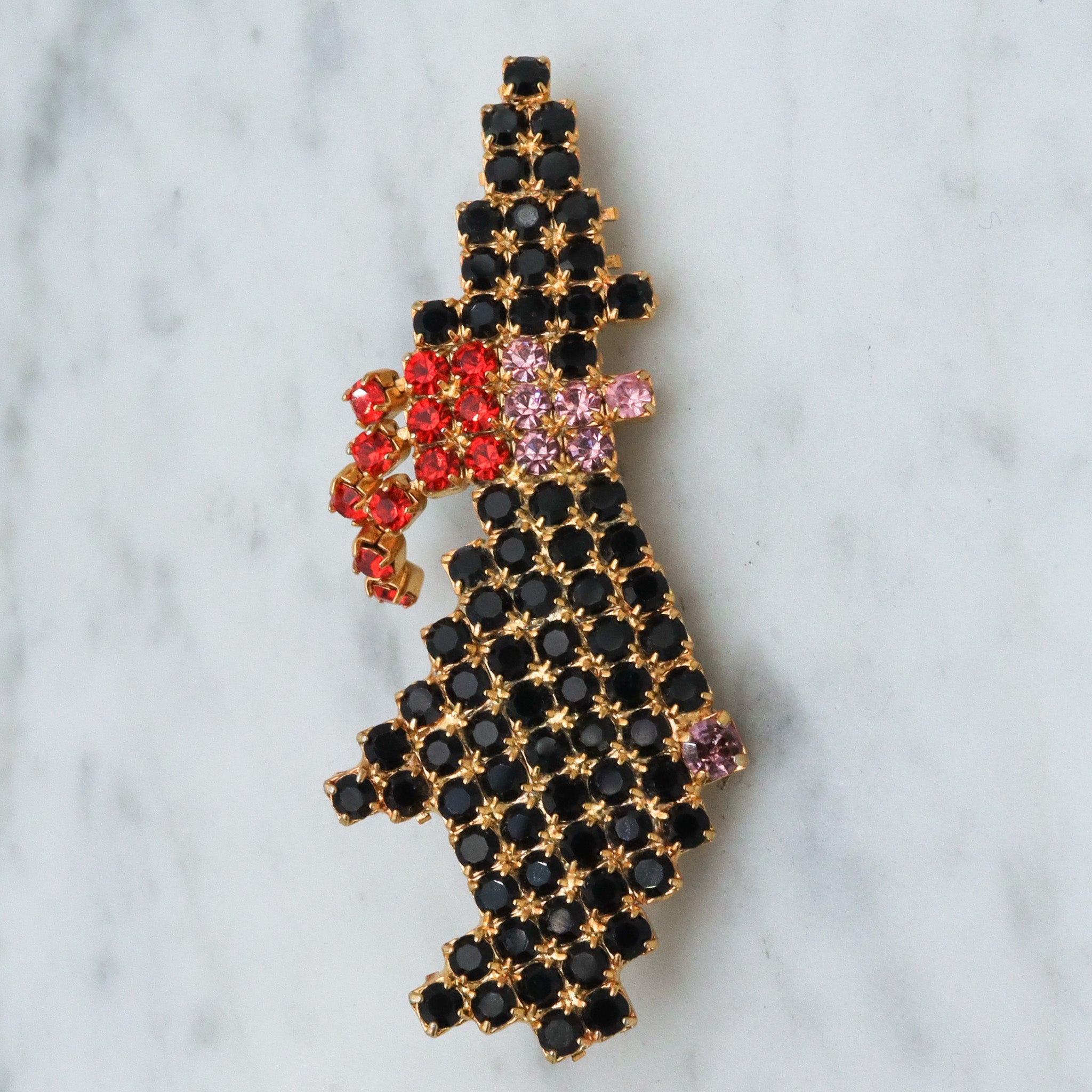 Vintage gold tone rhinestone witch brooch