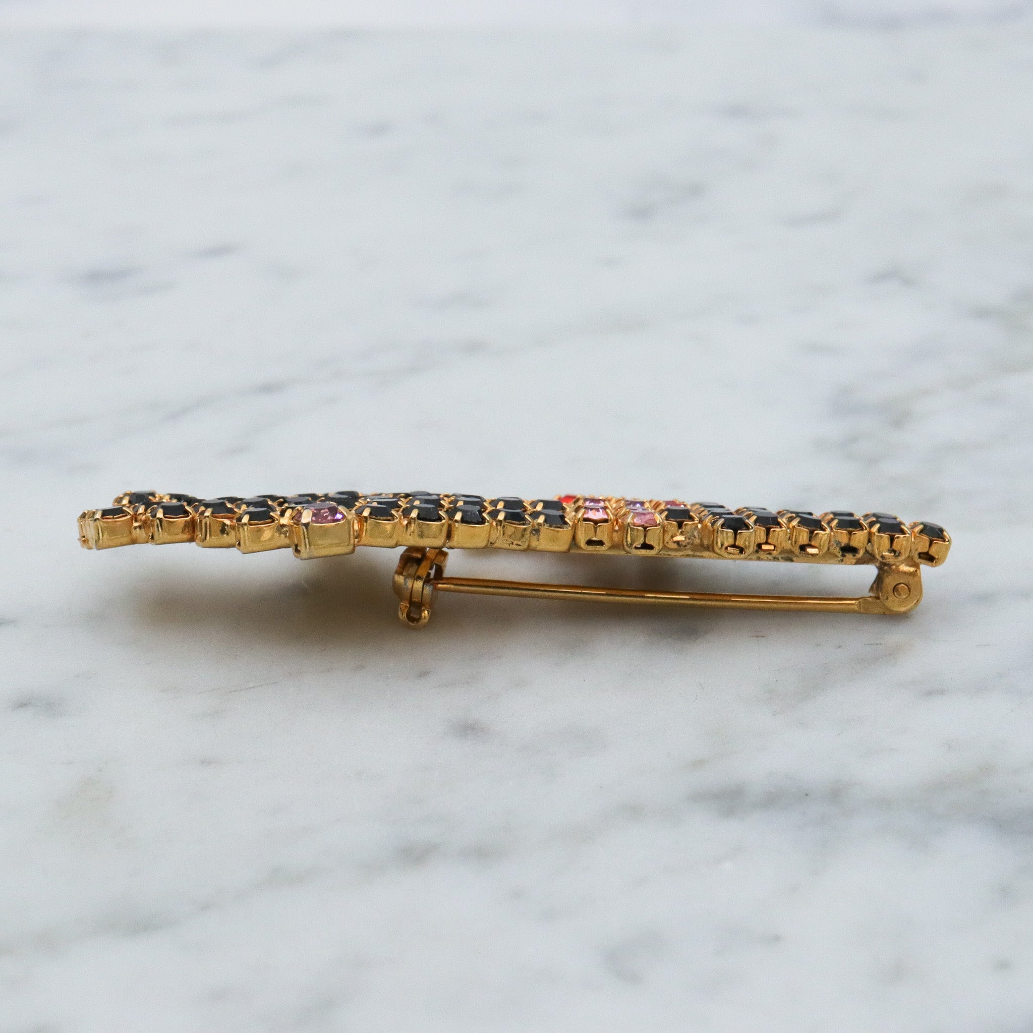 Vintage gold tone rhinestone witch brooch