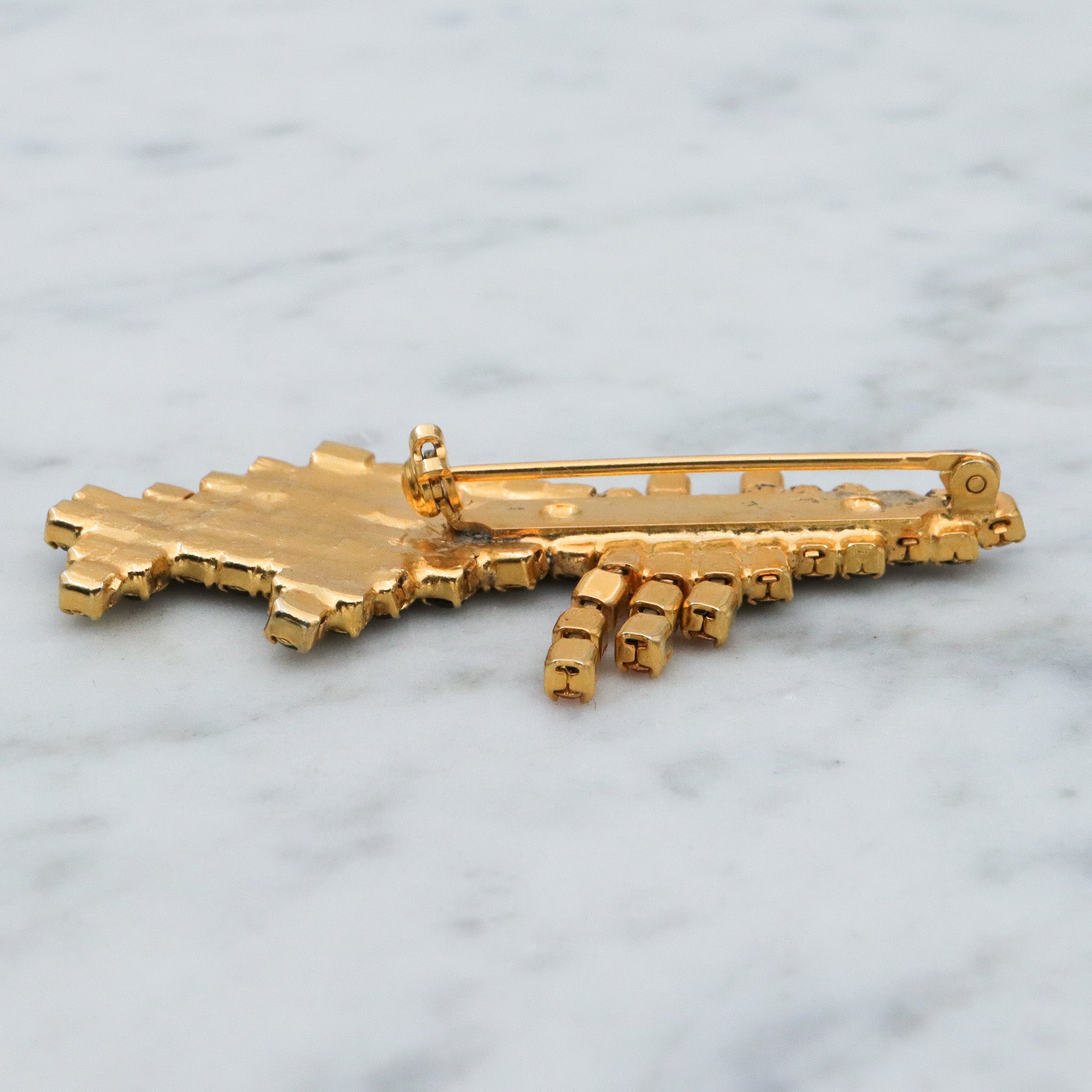 Vintage gold tone rhinestone witch brooch