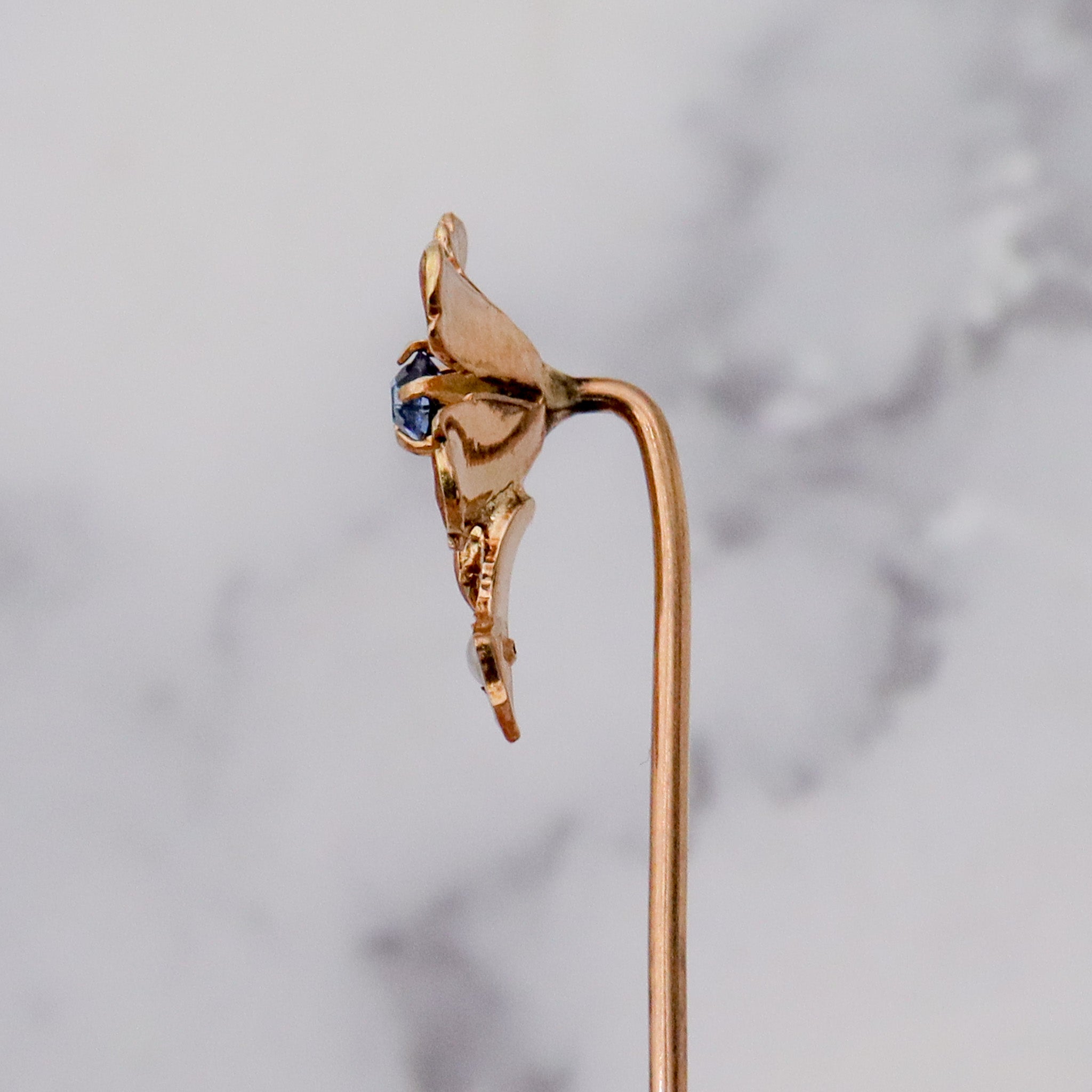 Antique Nouveau 10k gold, enamel, split pearl & faux sapphire stick pin