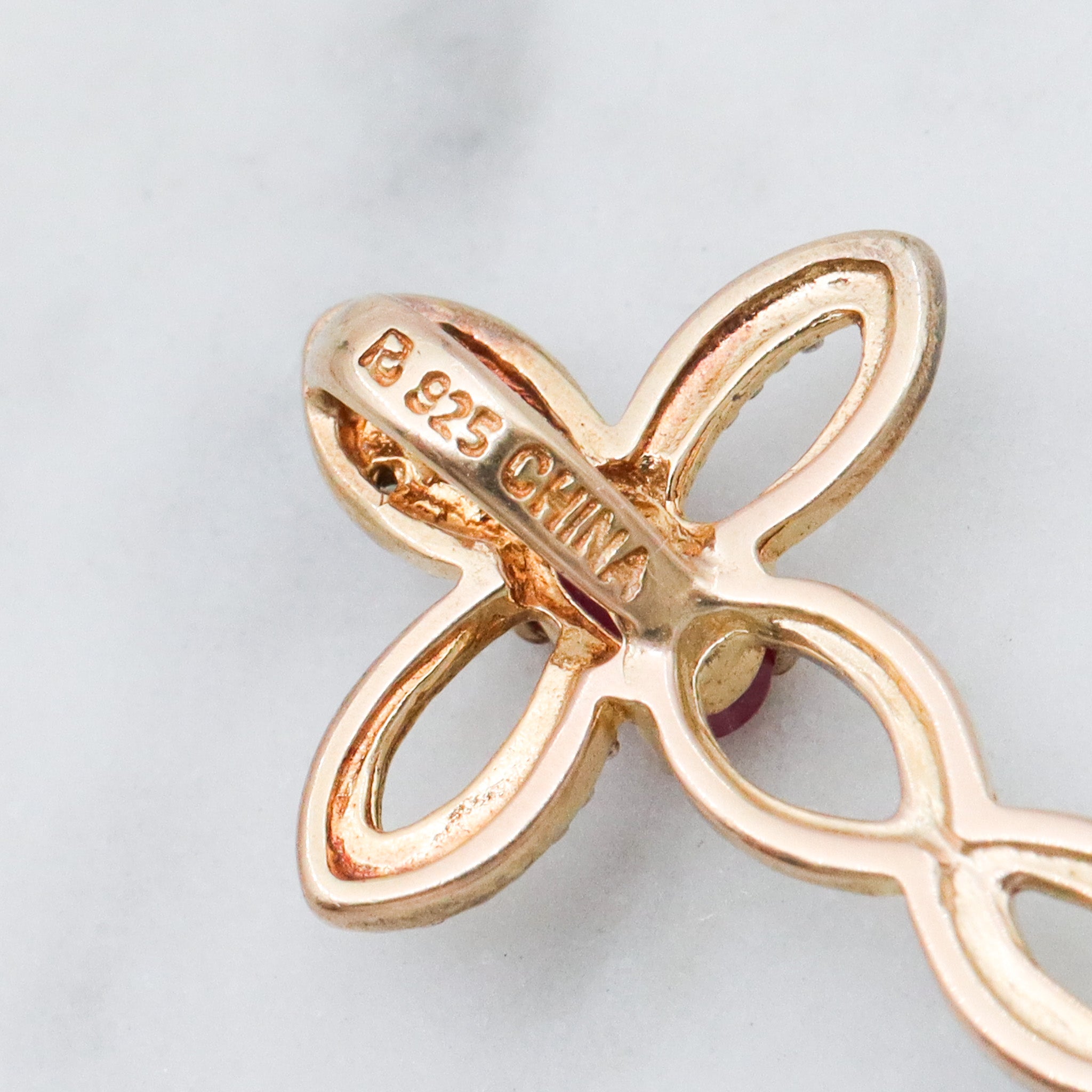 Vintage two toned sterling silver ruby & diamond cross pendant