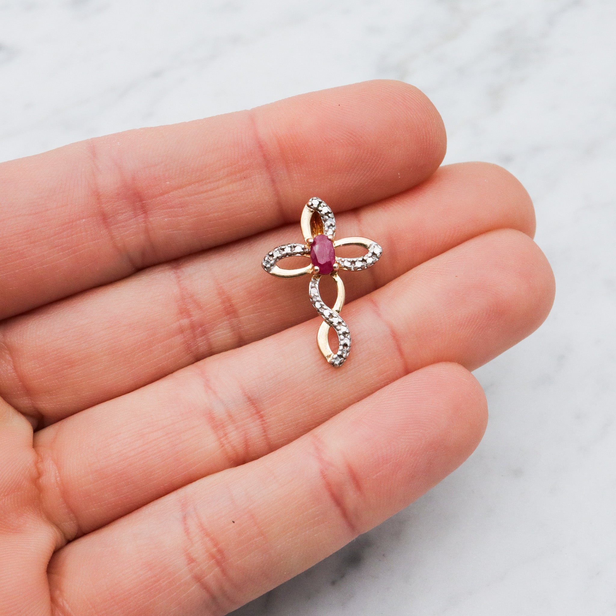 Vintage two toned sterling silver ruby & diamond cross pendant