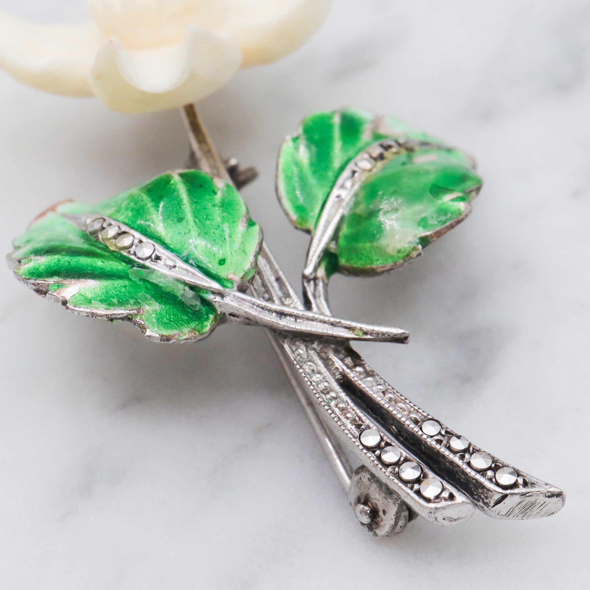 Antique German Art Deco sterling silver dogwood brooch with enamel & marcasite