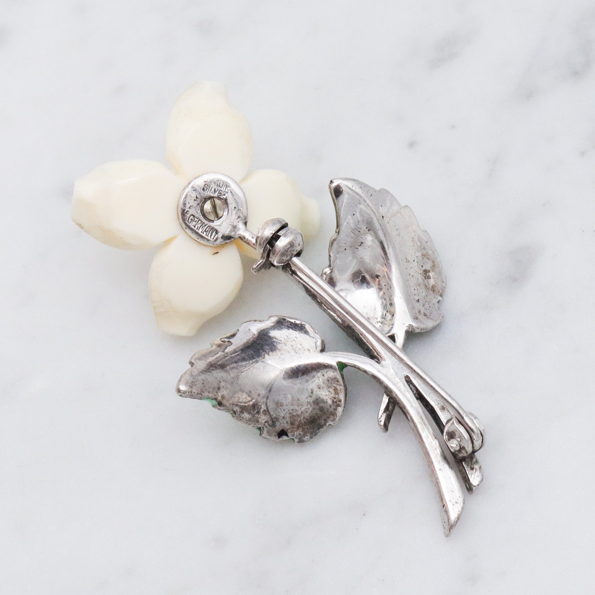 Antique German Art Deco sterling silver dogwood brooch with enamel & marcasite