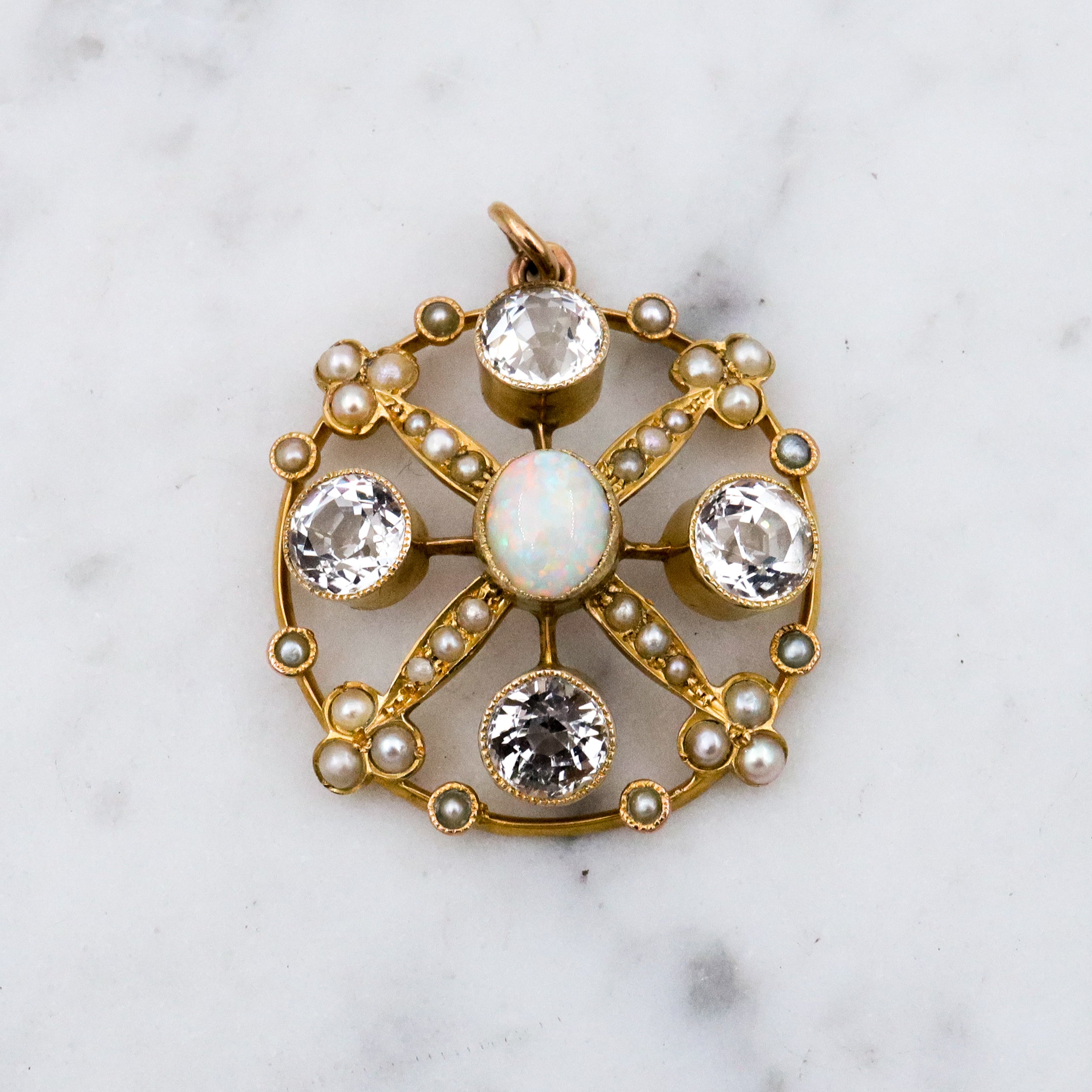 Antique Belle Epoque opal, white topaz, & pearl 9k gold circle pendant