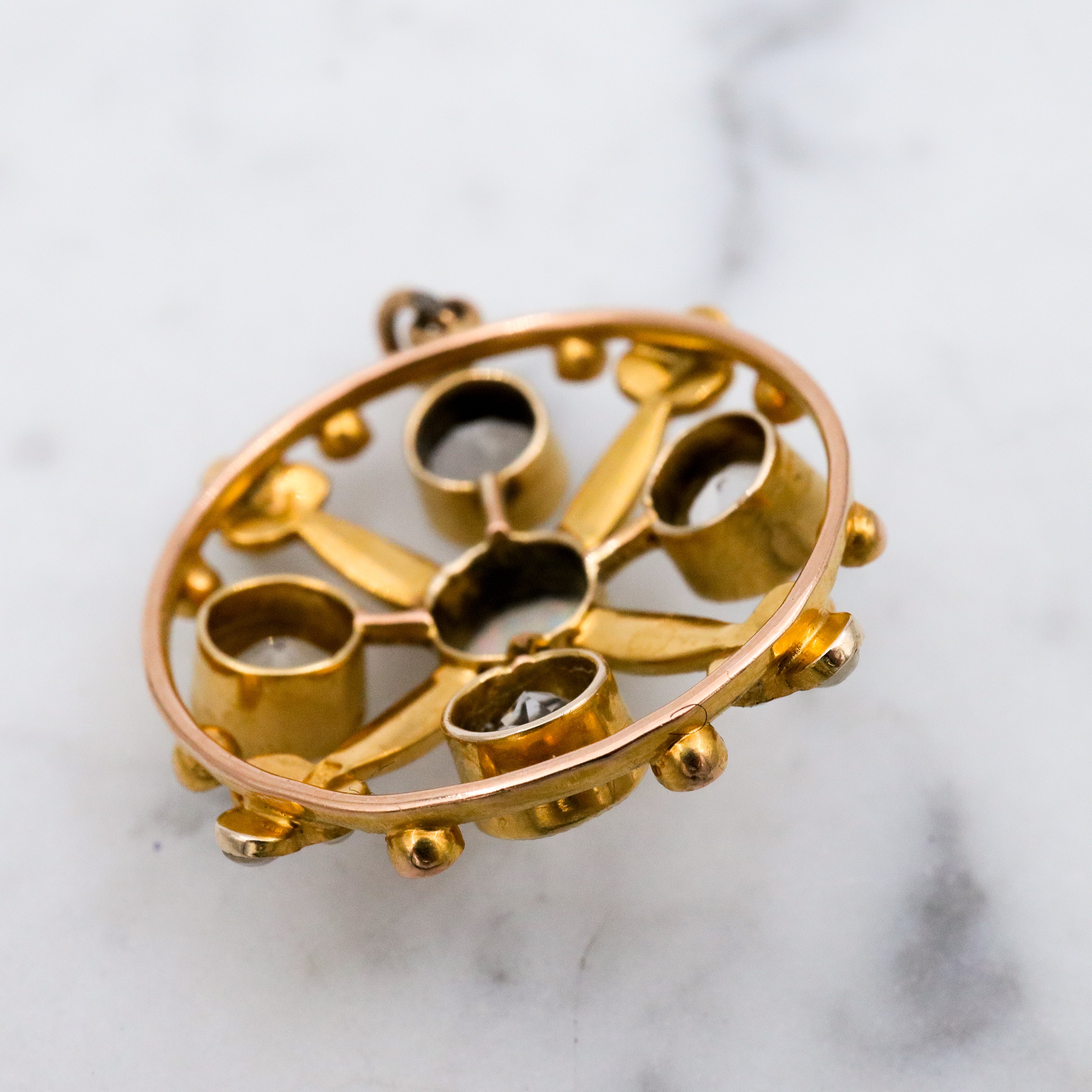 Antique Belle Epoque opal, white topaz, & pearl 9k gold circle pendant