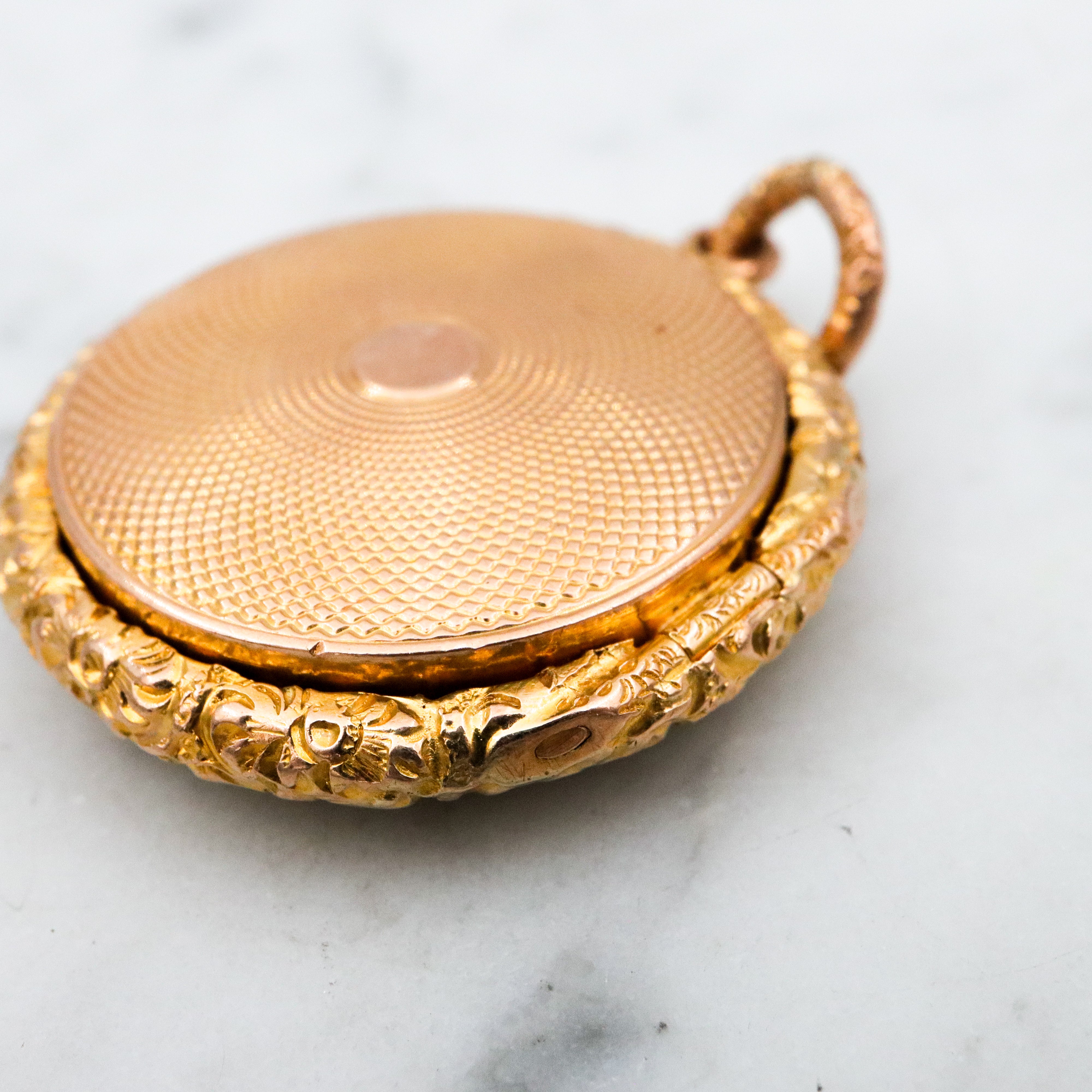 Antique Victorian 9k gold repousse shadow box locket pendant