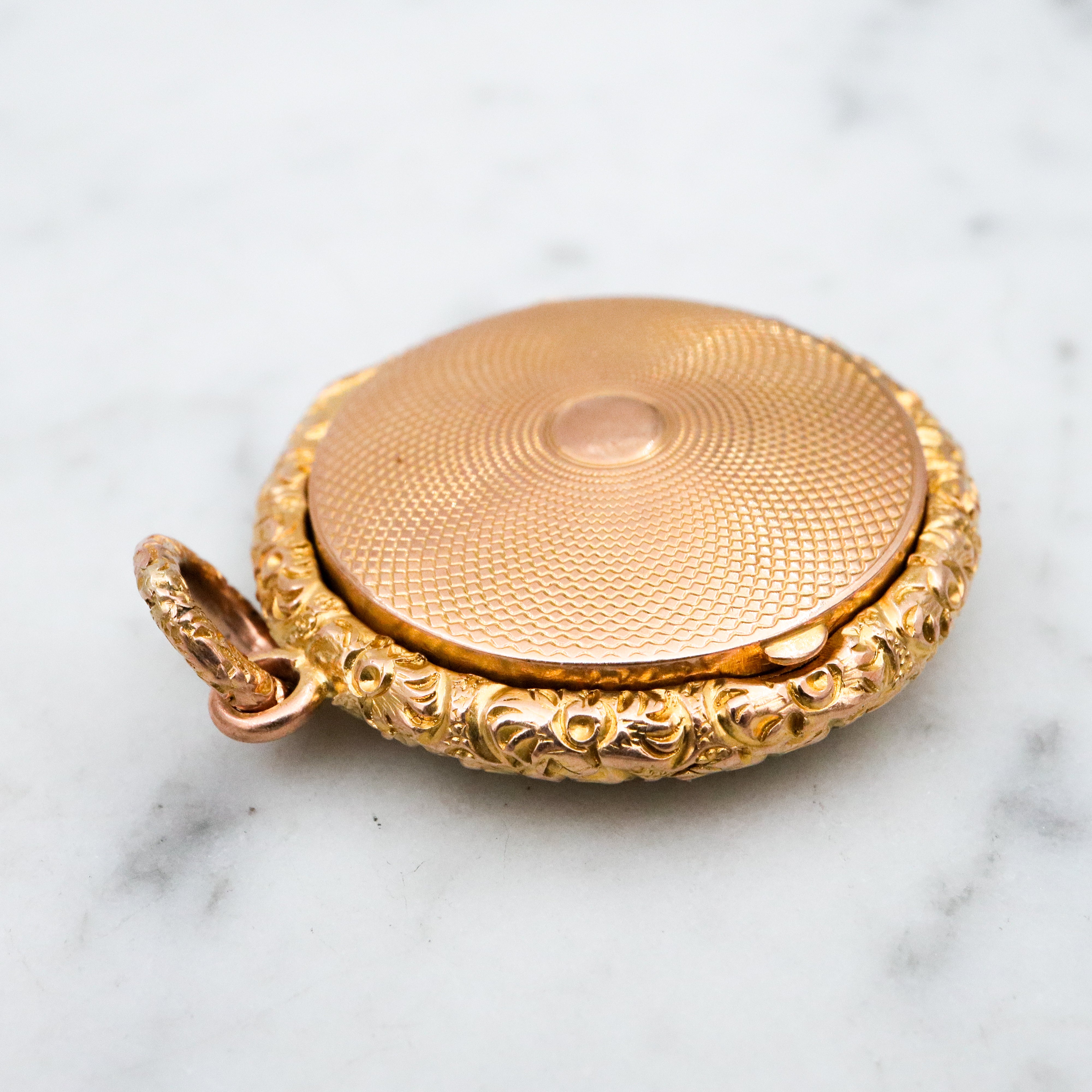 Antique Victorian 9k gold repousse shadow box locket pendant