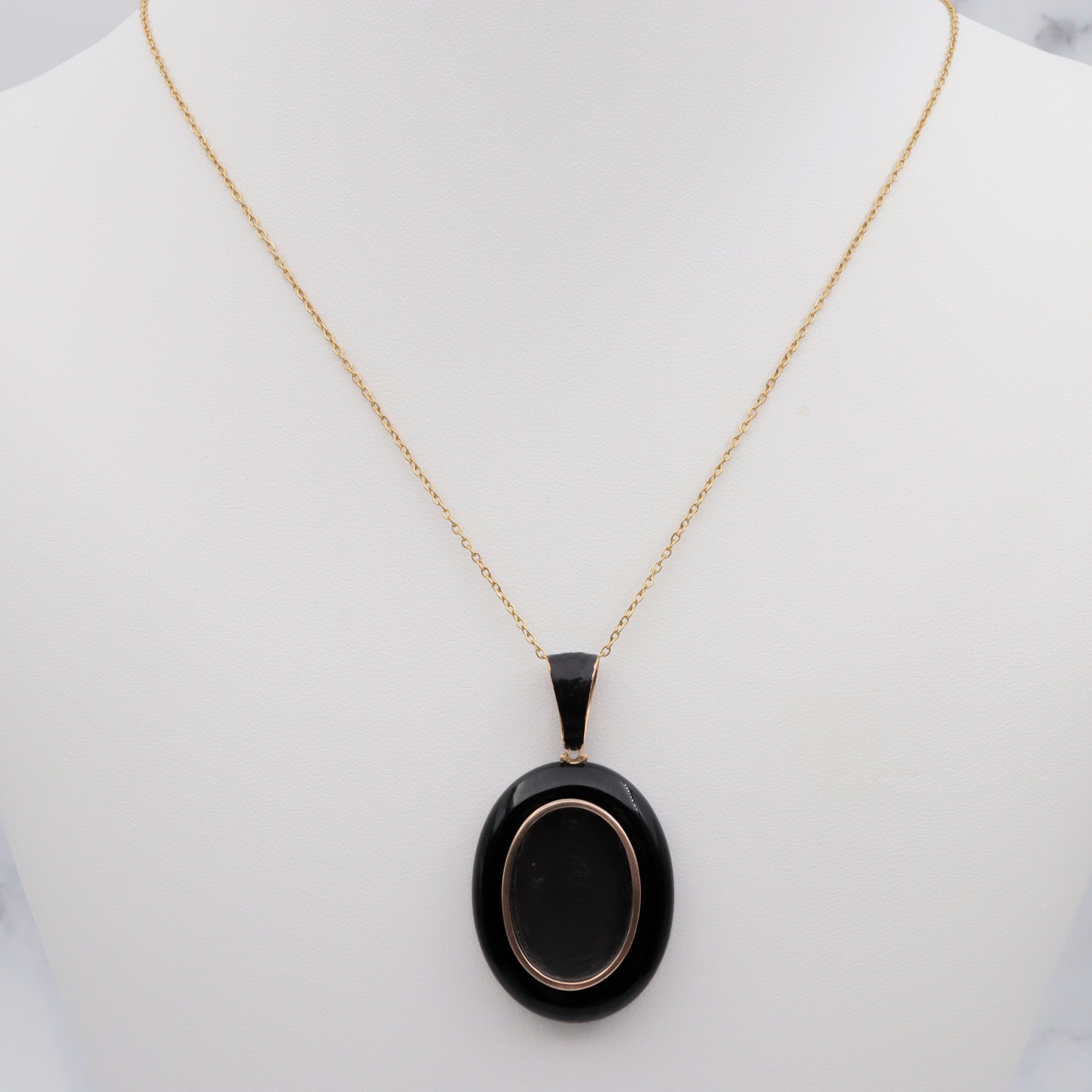 Antique victorian 18K gold and onyx mourning locket