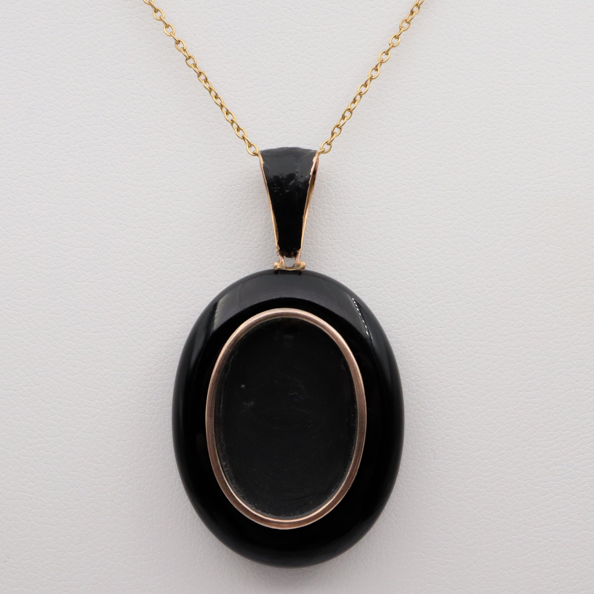 Antique victorian 18K gold and onyx mourning locket