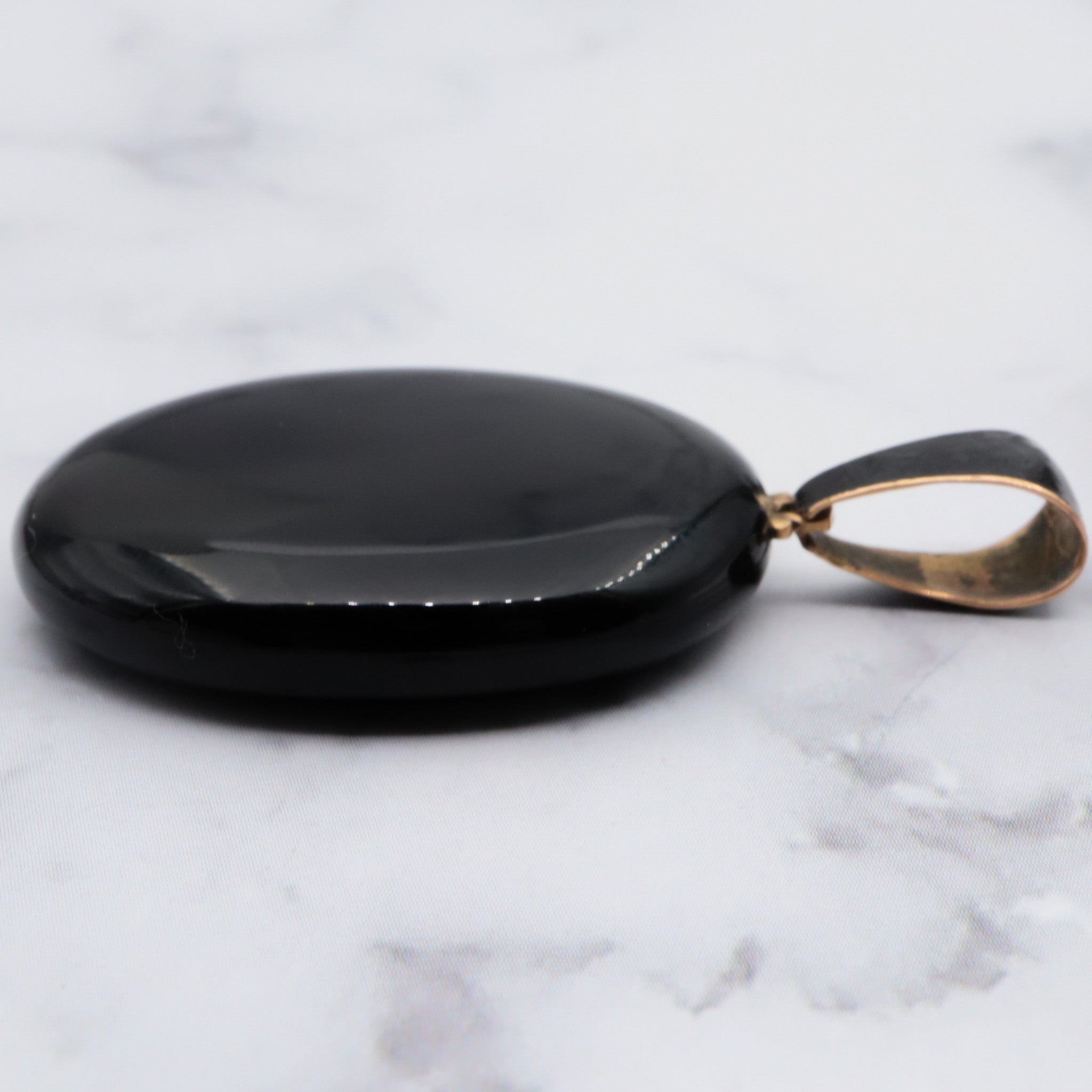 Antique victorian 18K gold and onyx mourning locket