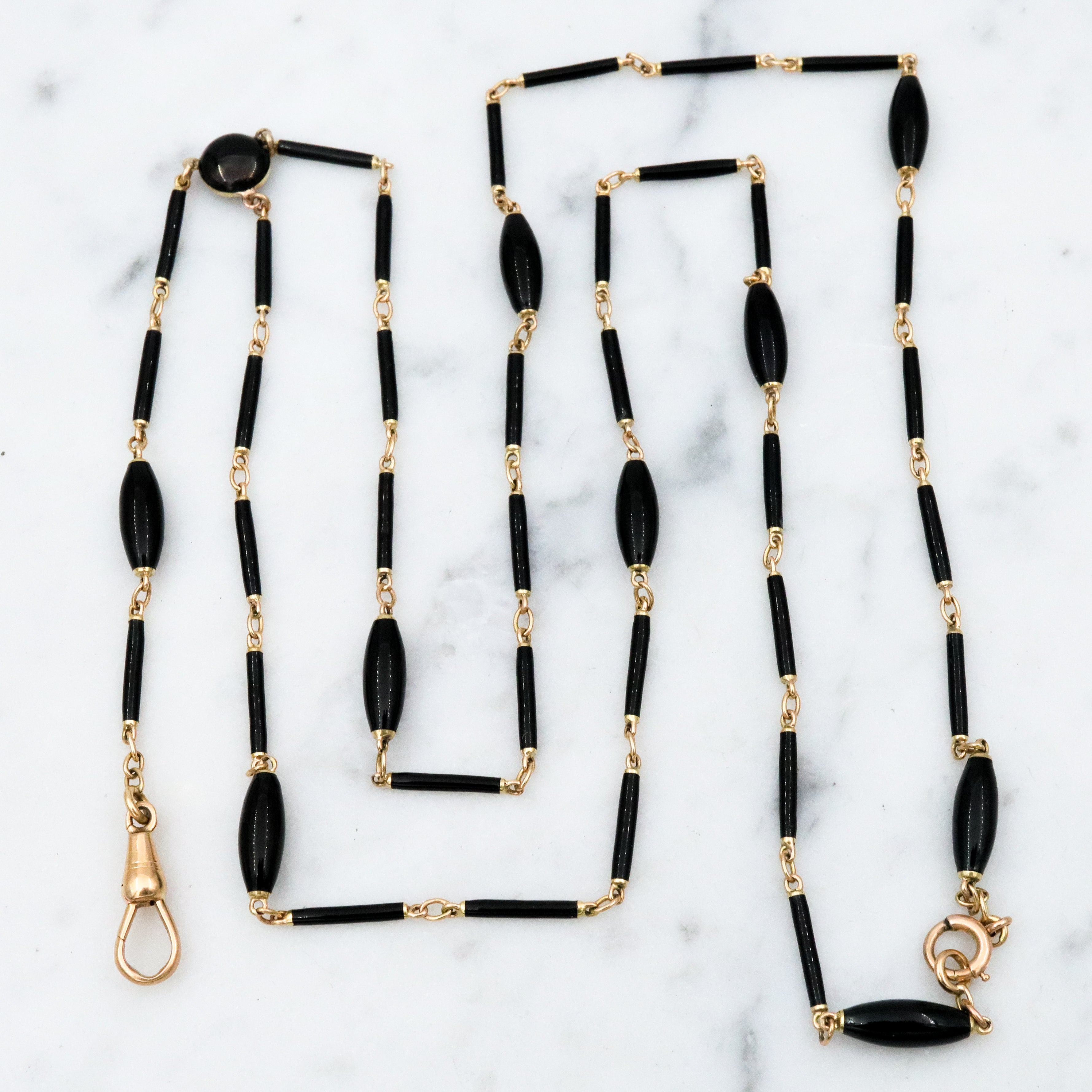 Antique Victorian Carter, Gough & Co. 14k gold black enamel barrel link necklace with 