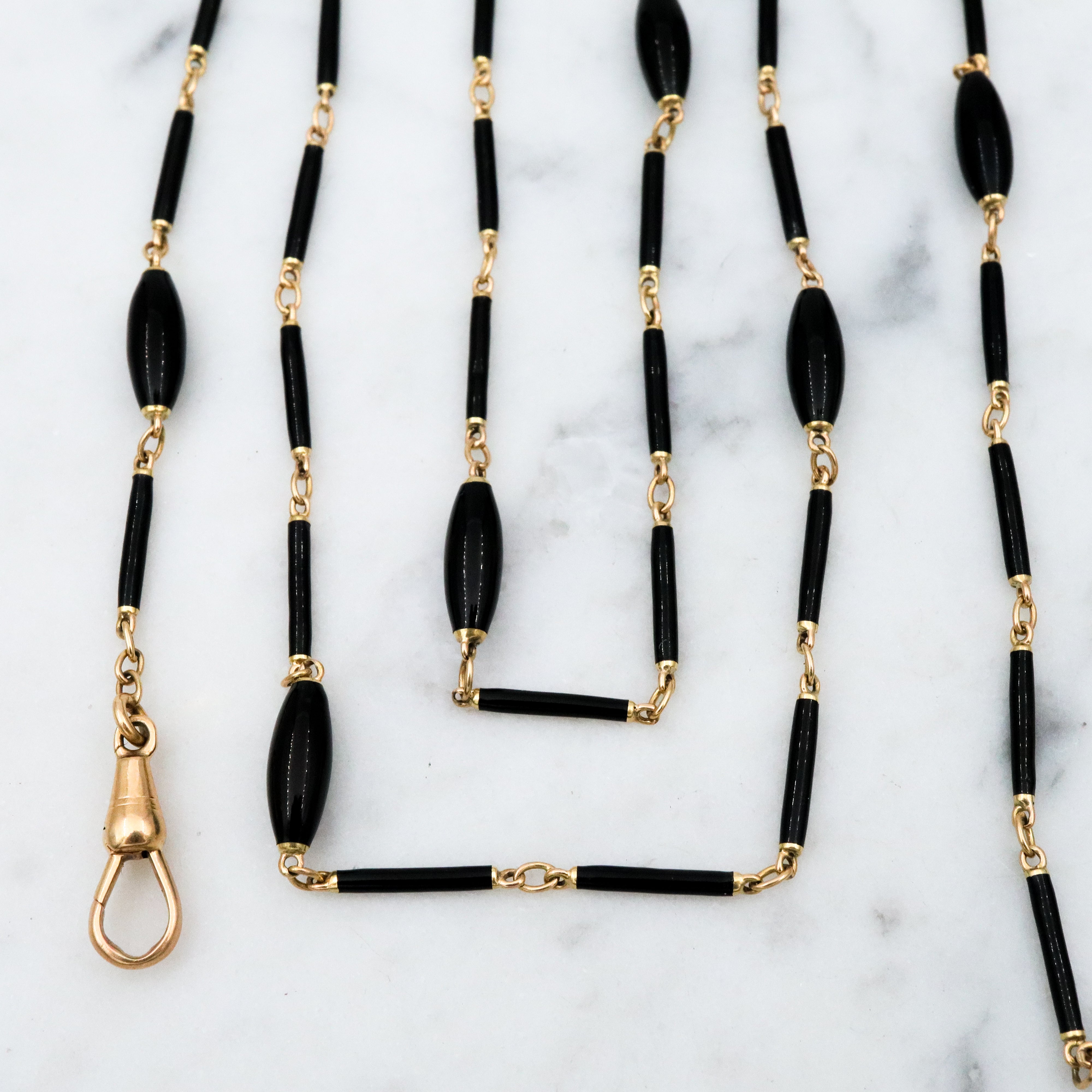 Antique Victorian Carter, Gough & Co. 14k gold black enamel barrel link necklace with "Y" drop and dog clip fastener