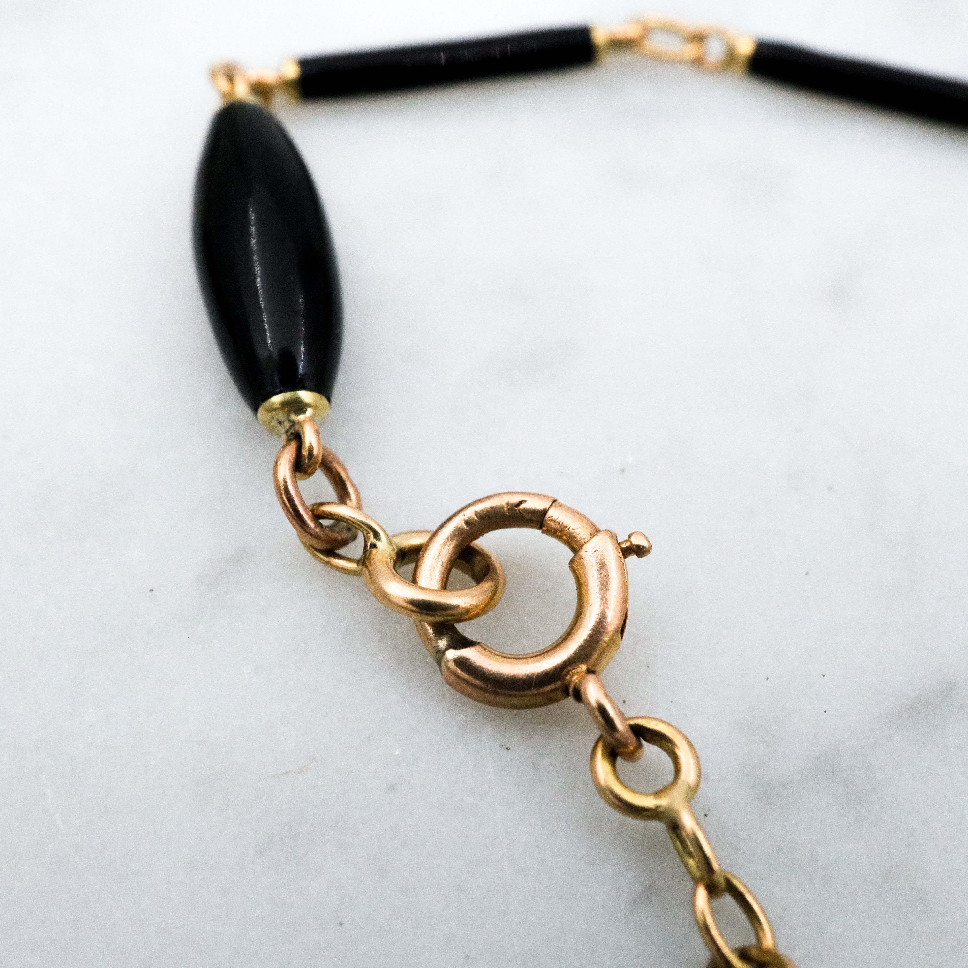Antique Victorian Carter, Gough & Co. 14k gold black enamel barrel link necklace with "Y" drop and dog clip fastener