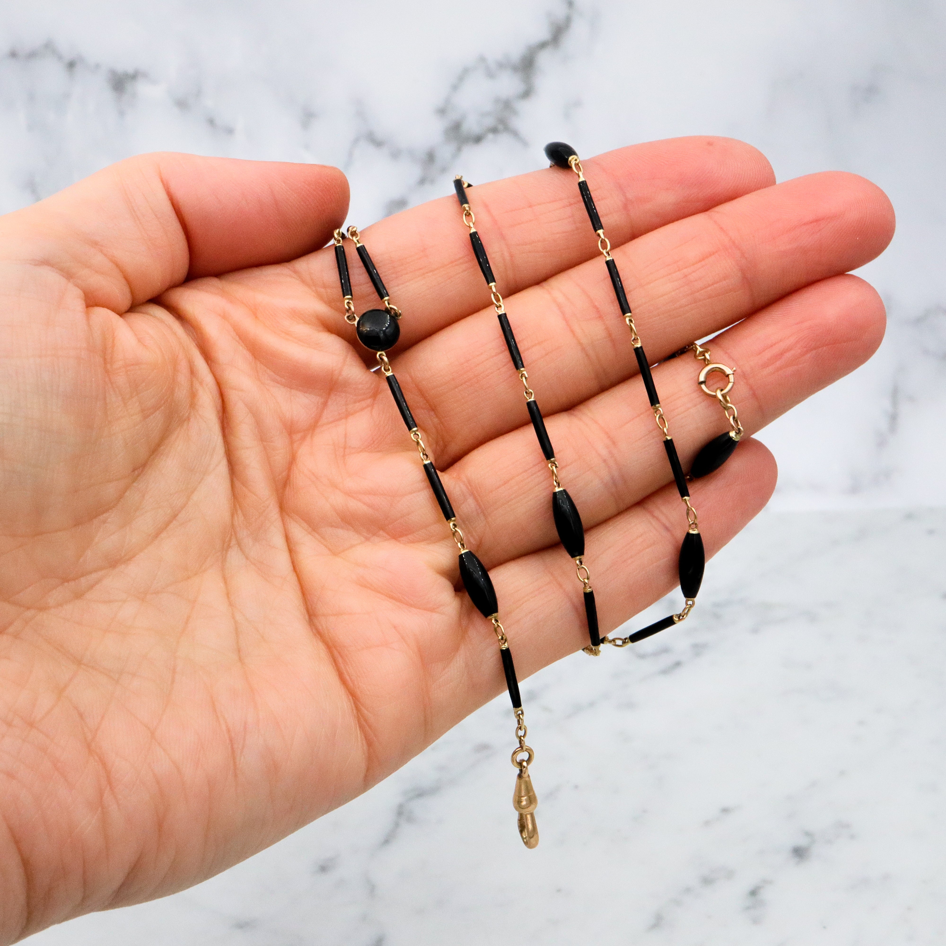 Antique Victorian Carter, Gough & Co. 14k gold black enamel barrel link necklace with 