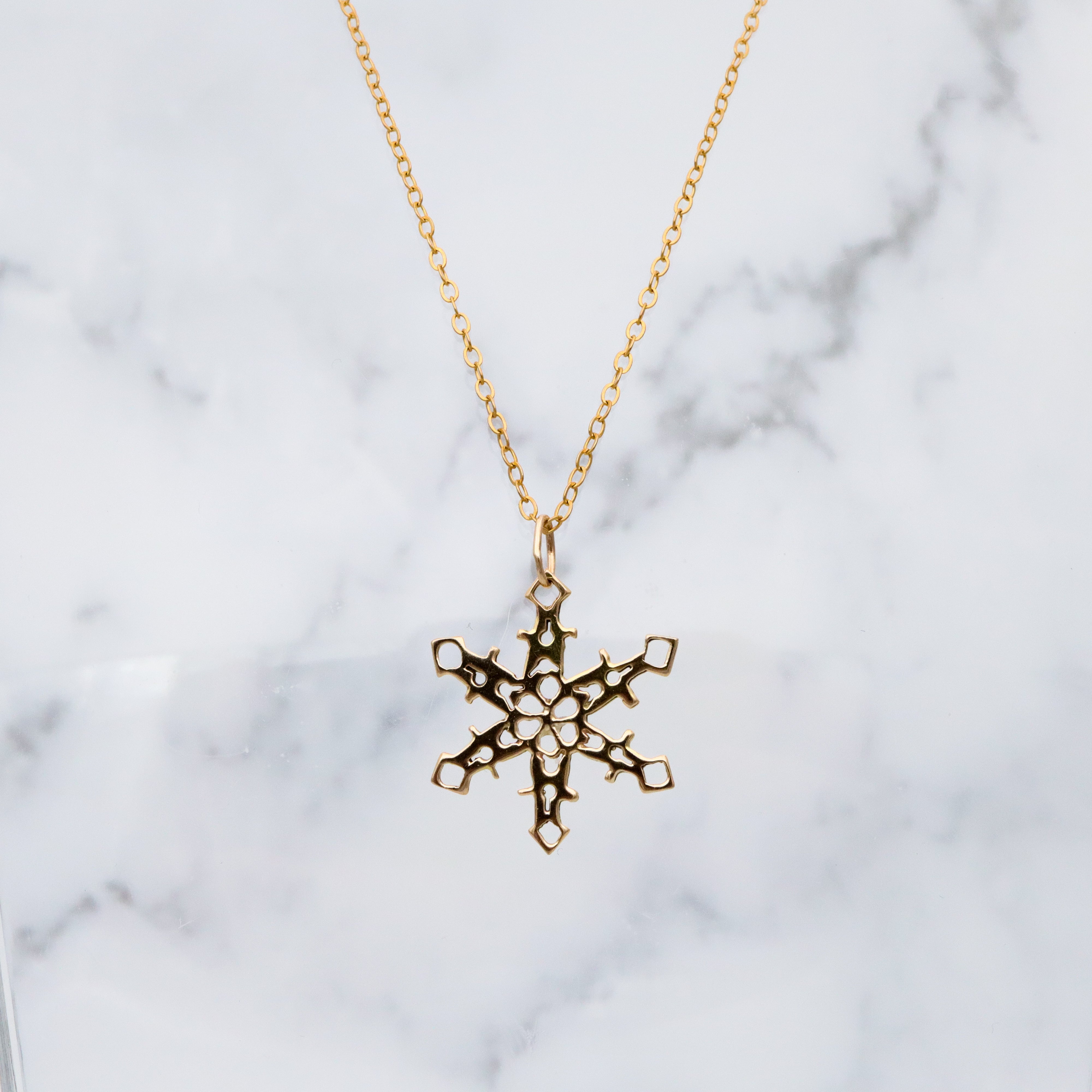 vintage 14k gold snowflake charm pendant